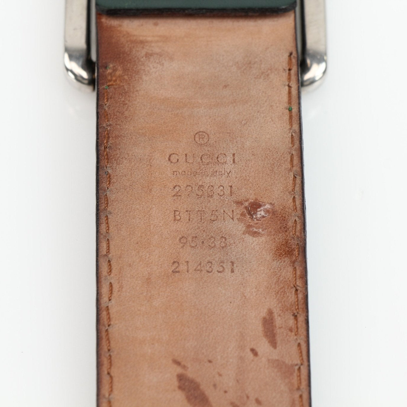 Gucci red and green web belt with gold buckle, stylish accessories for men and women, displayed on a neutral background.