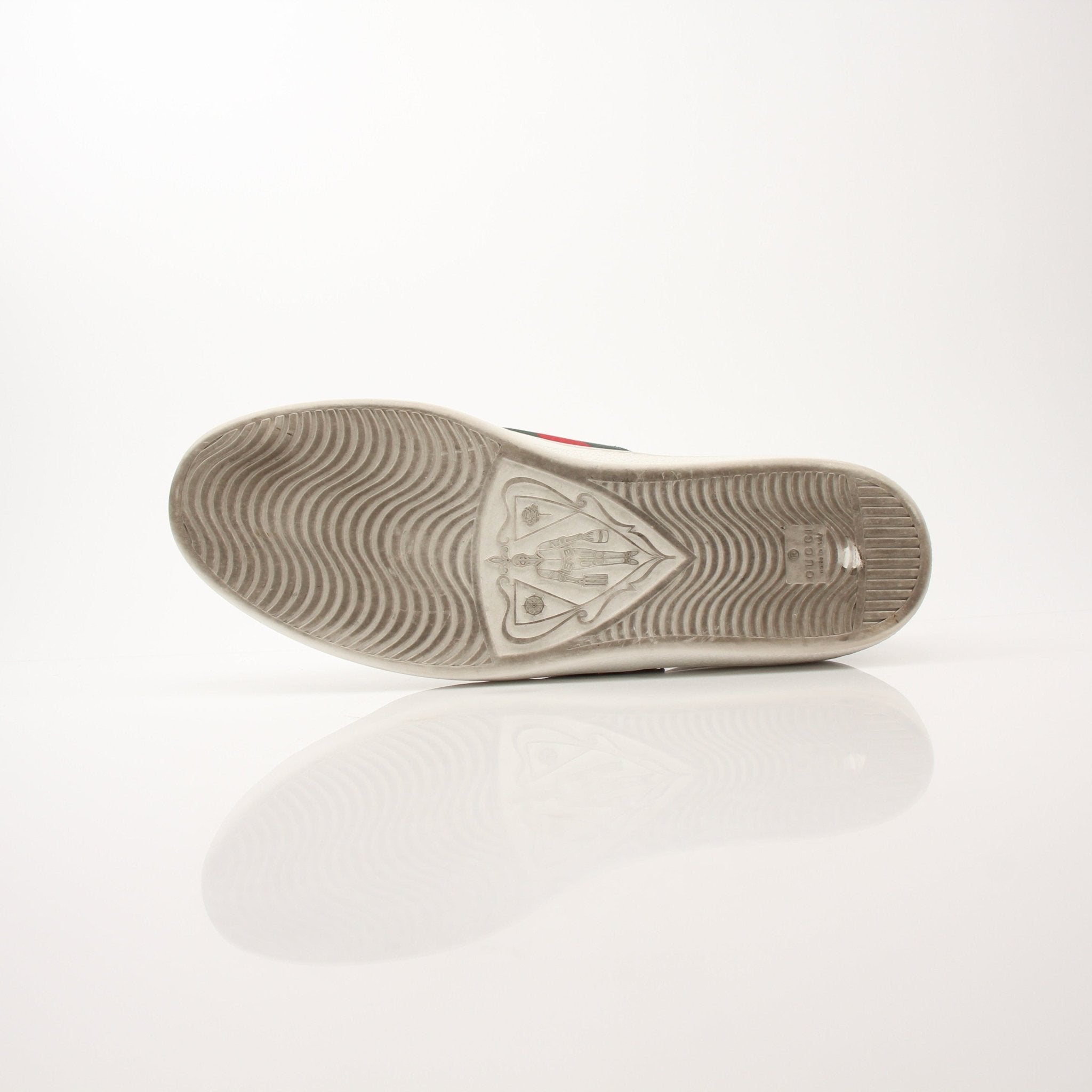 Gucci Men’s GG Apple Sneakers by Gold & Beyond, stylish shoes with Gucci logo and vibrant green and red accents on white sneakers.