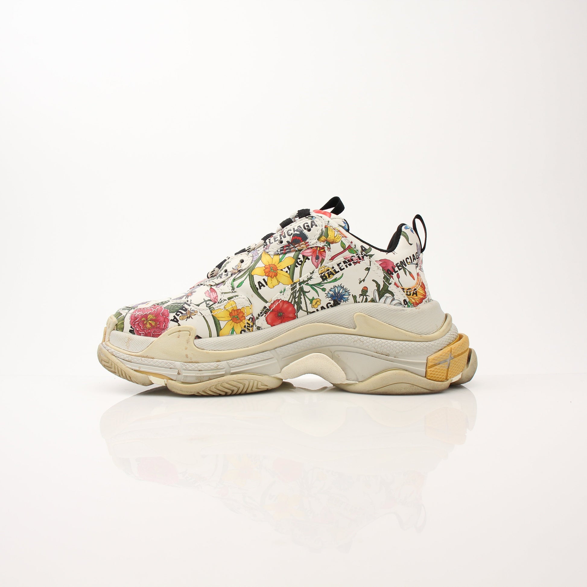 Gucci x Balenciaga The Hacker Project Triple S sneakers by Gold & Beyond, showcasing their unique design and bold style.