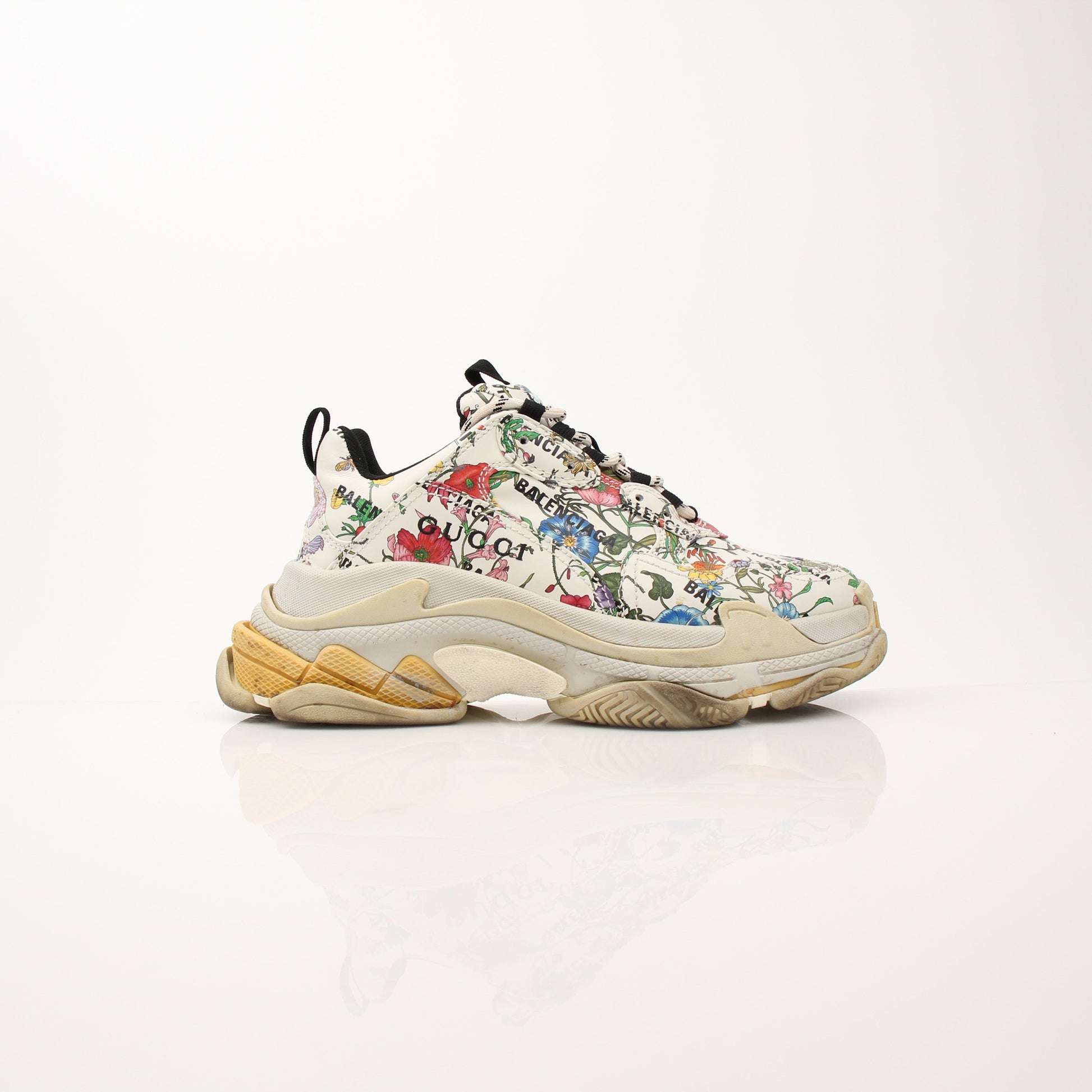 Gucci x Balenciaga The Hacker Project Triple S sneakers by Gold & Beyond, showing the chunky multi-layered shoe with bold design.