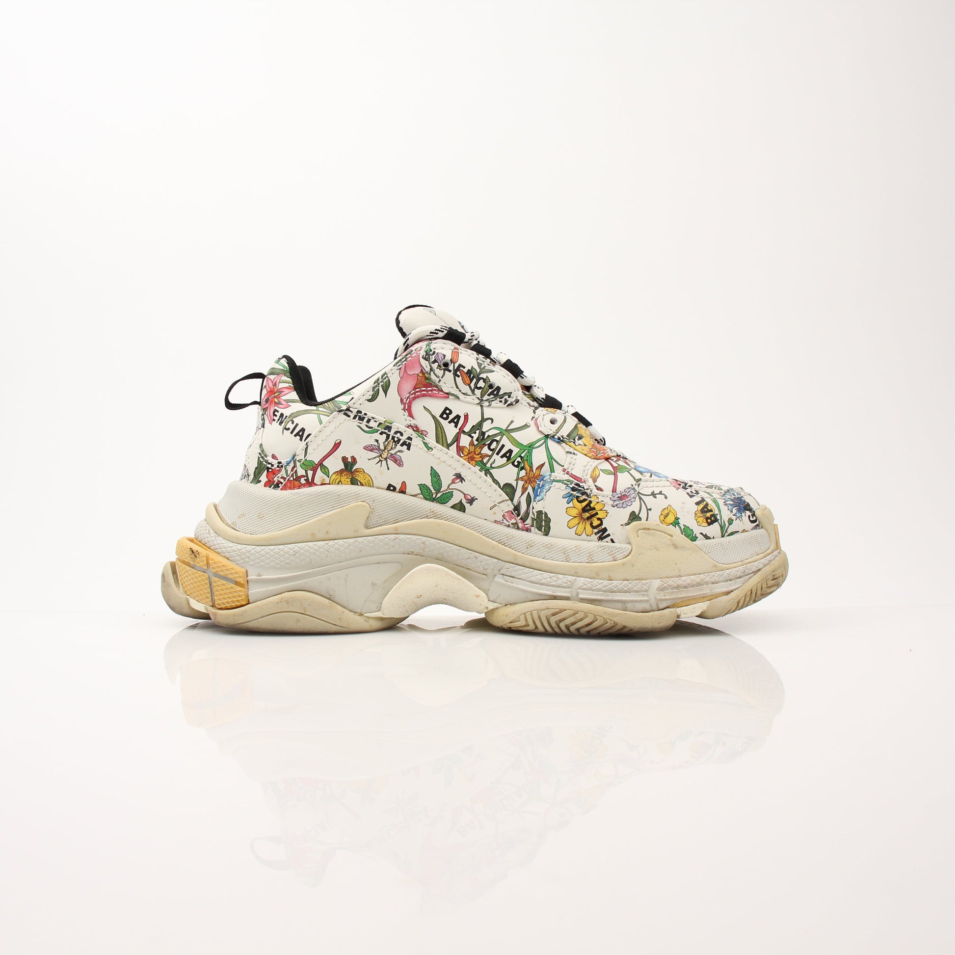 Gold & Beyond Gucci x Balenciaga The Hacker Project Triple S sneakers with multi-color design and chunky sole, front view.