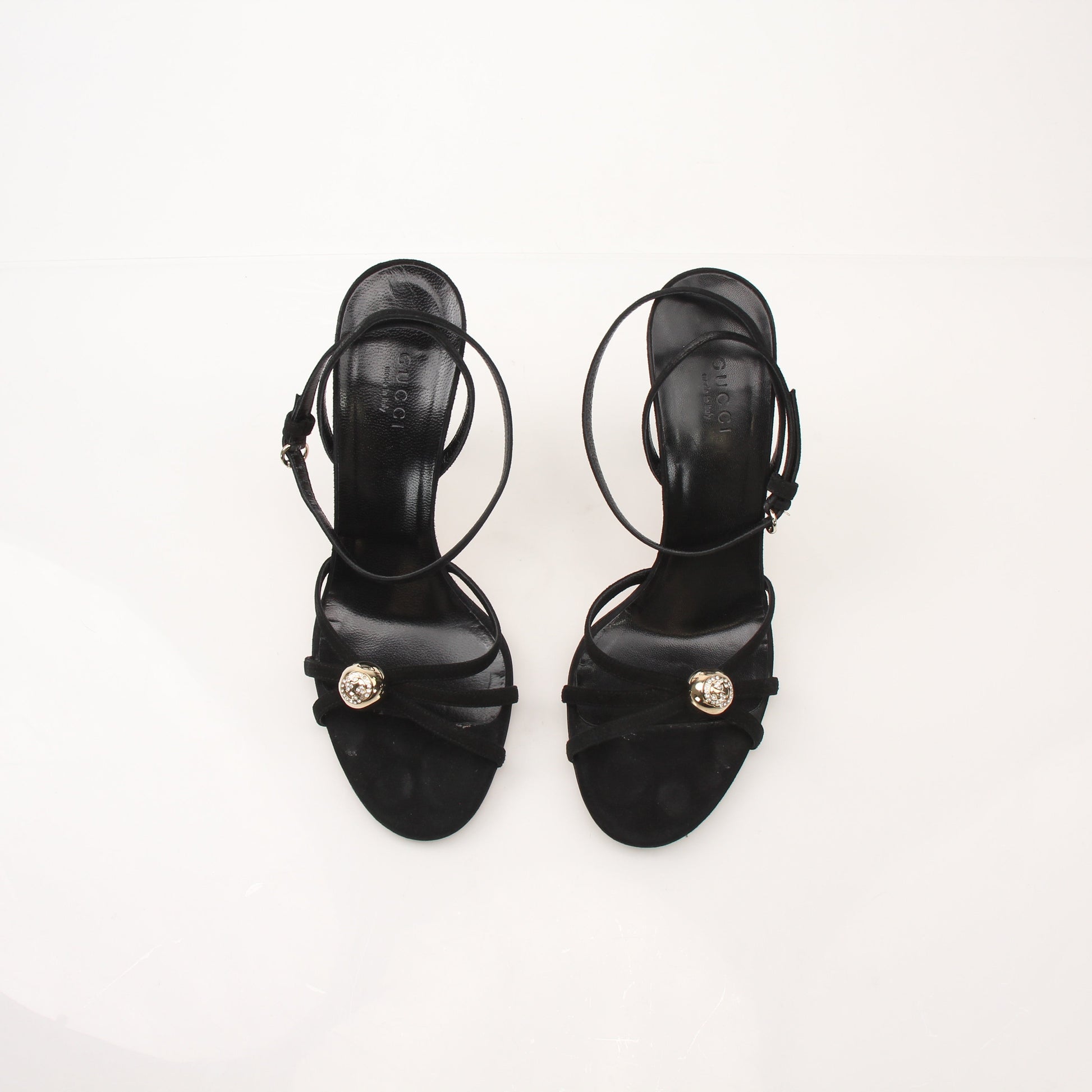 Gold & Beyond Gucci women’s black GG crystal-embellished sandals, stylish shoes with sparkling details and comfortable design.