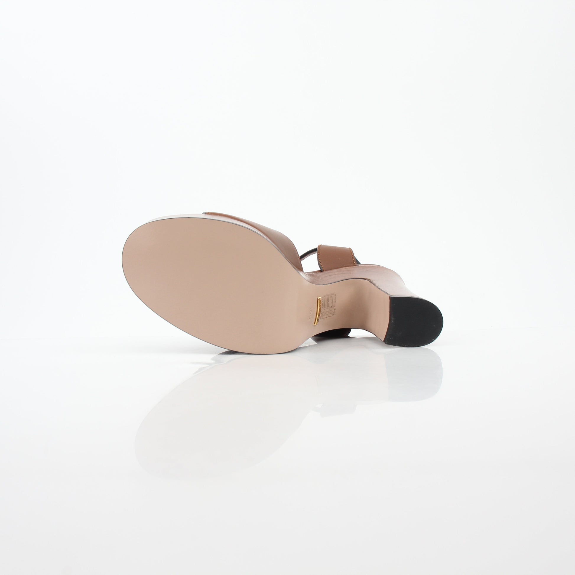 Gold & Beyond Gucci brown interlocking G cut-out platform sandals with heels, showcasing stylish design and ankle straps.