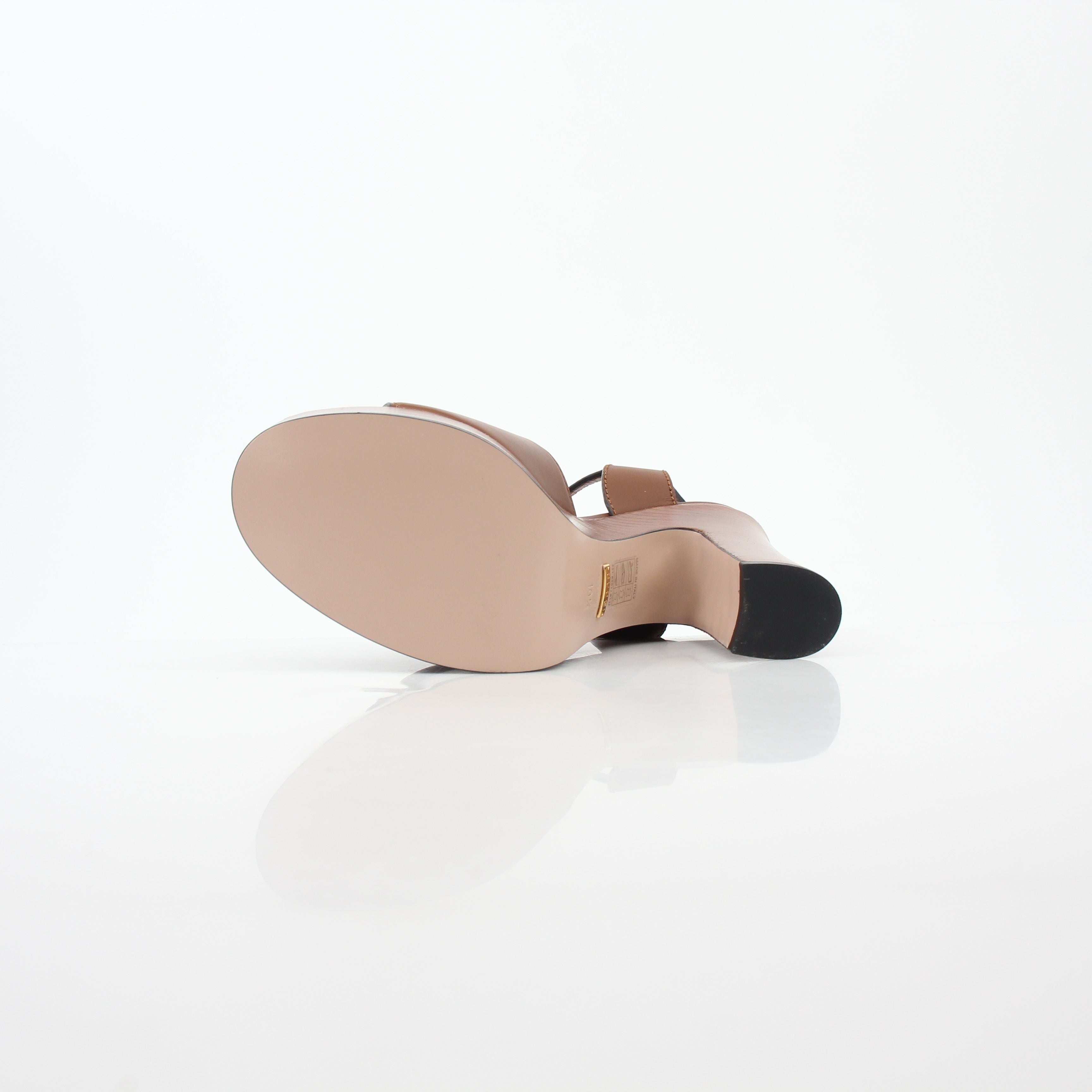 Gold & Beyond Gucci brown interlocking G cut-out platform sandals with heels, showcasing stylish design and ankle straps.