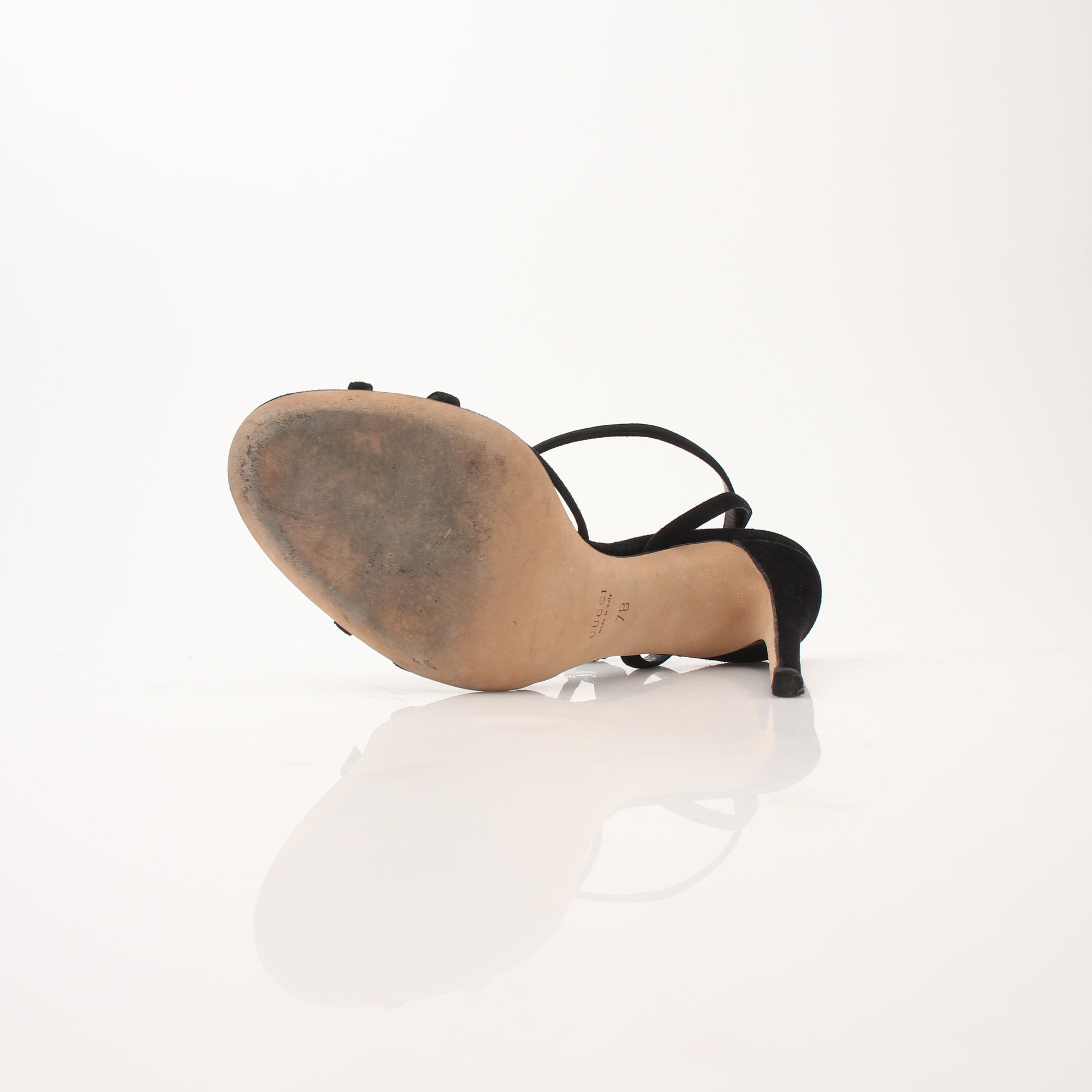 Gold & Beyond Gucci women’s black sandals with GG crystal embellishments, featuring open toes and stylish ankle straps.