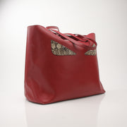 Red Fendi Monster Roll Tote Handbag by Gold & Beyond featuring bold design and spacious interior, perfect for stylish everyday use.