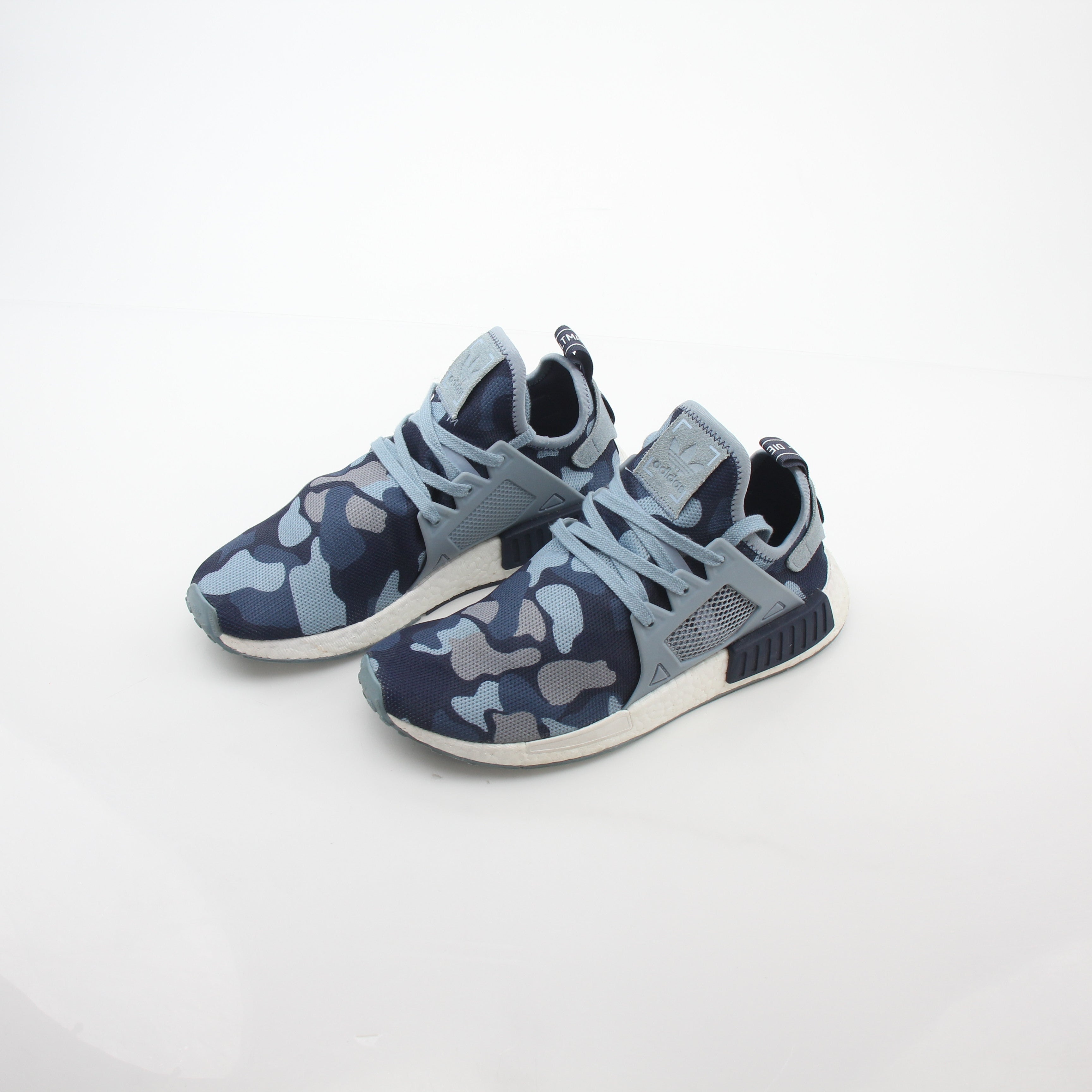 Adidas NMD XR1 PK Blue Duck Camo sneakers with boost soles and branded details, displayed on a white background.