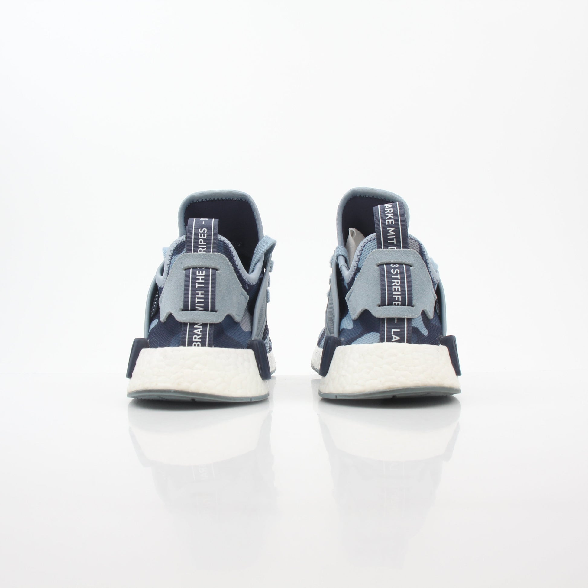 Gold & Beyond Adidas NMD XR1 PK Blue Duck Camo sneakers, athletic shoes with blue camo pattern and modern design.