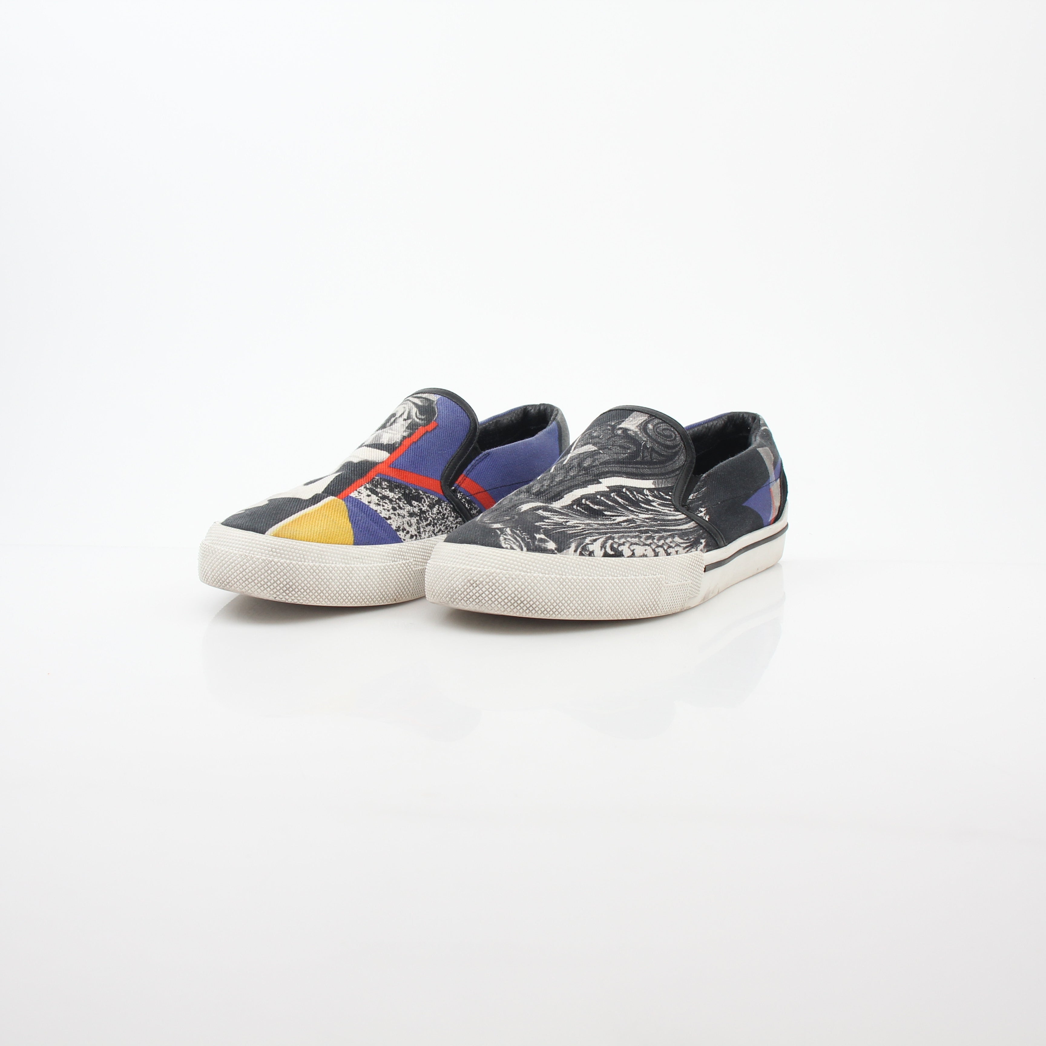 Versace men's graphic print canvas slip-on sneakers with bold design and comfortable fit, by Gold & Beyond.