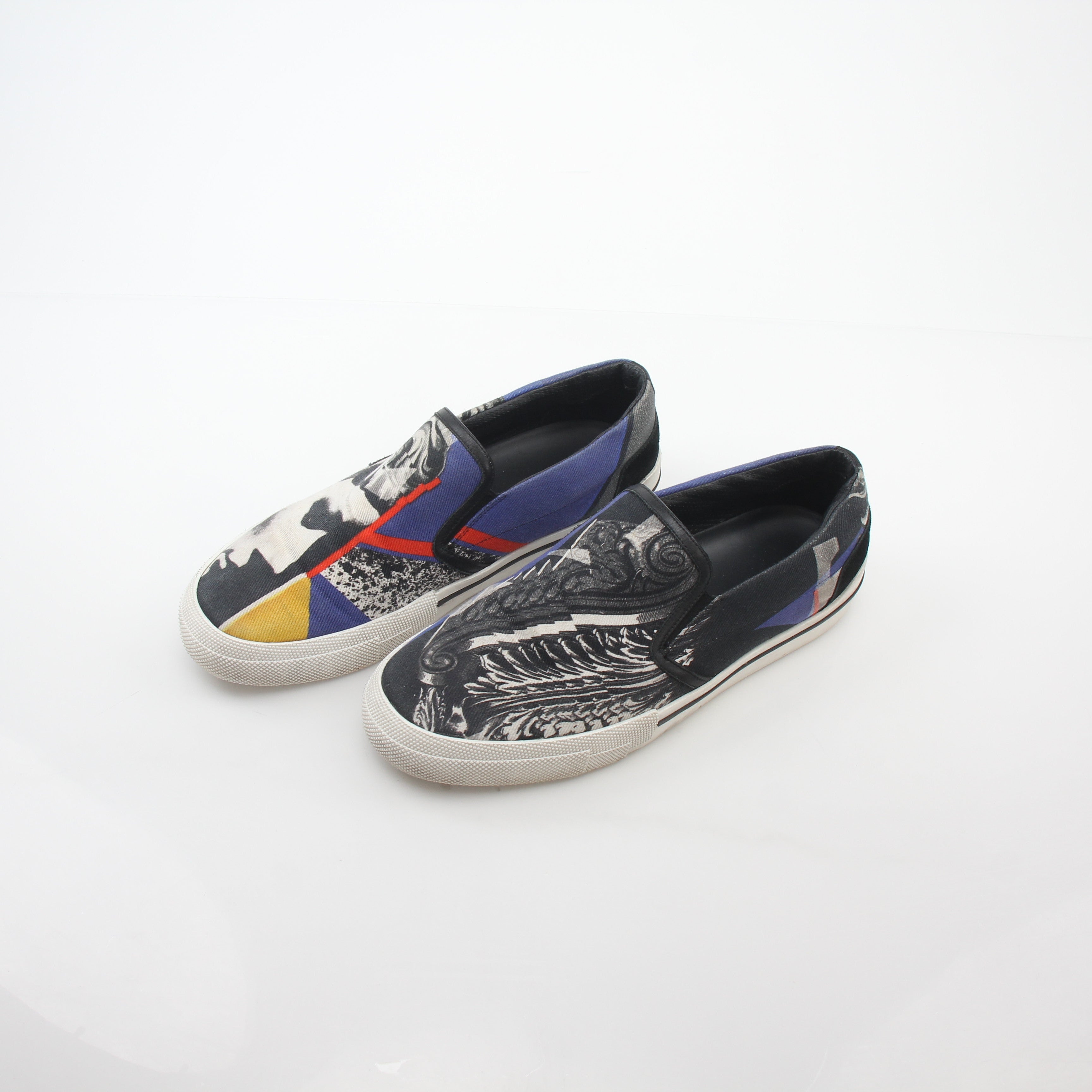 Versace men's graphic print canvas slip-on sneakers with bold design, featuring comfortable slip-on style and stylish branding.