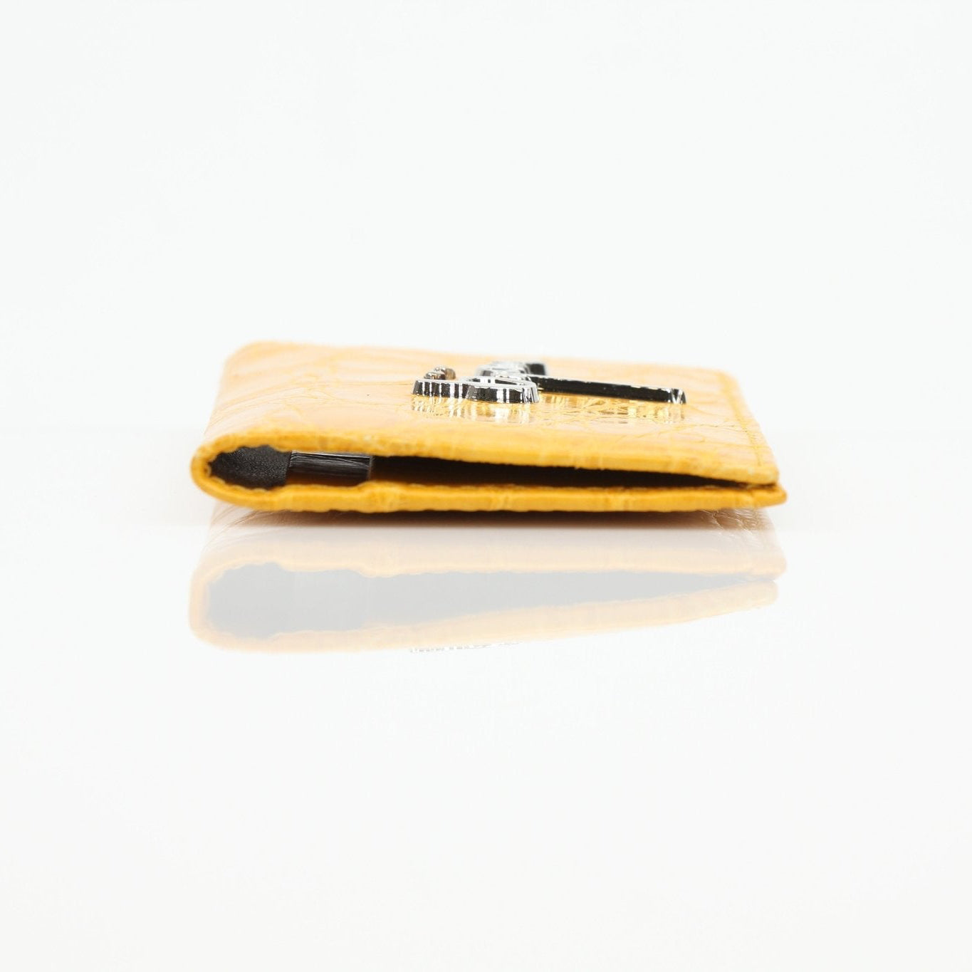 Gold & Beyond Bijan yellow crocodile wallet, showcasing textured crocodile leather with a sleek, compact design.