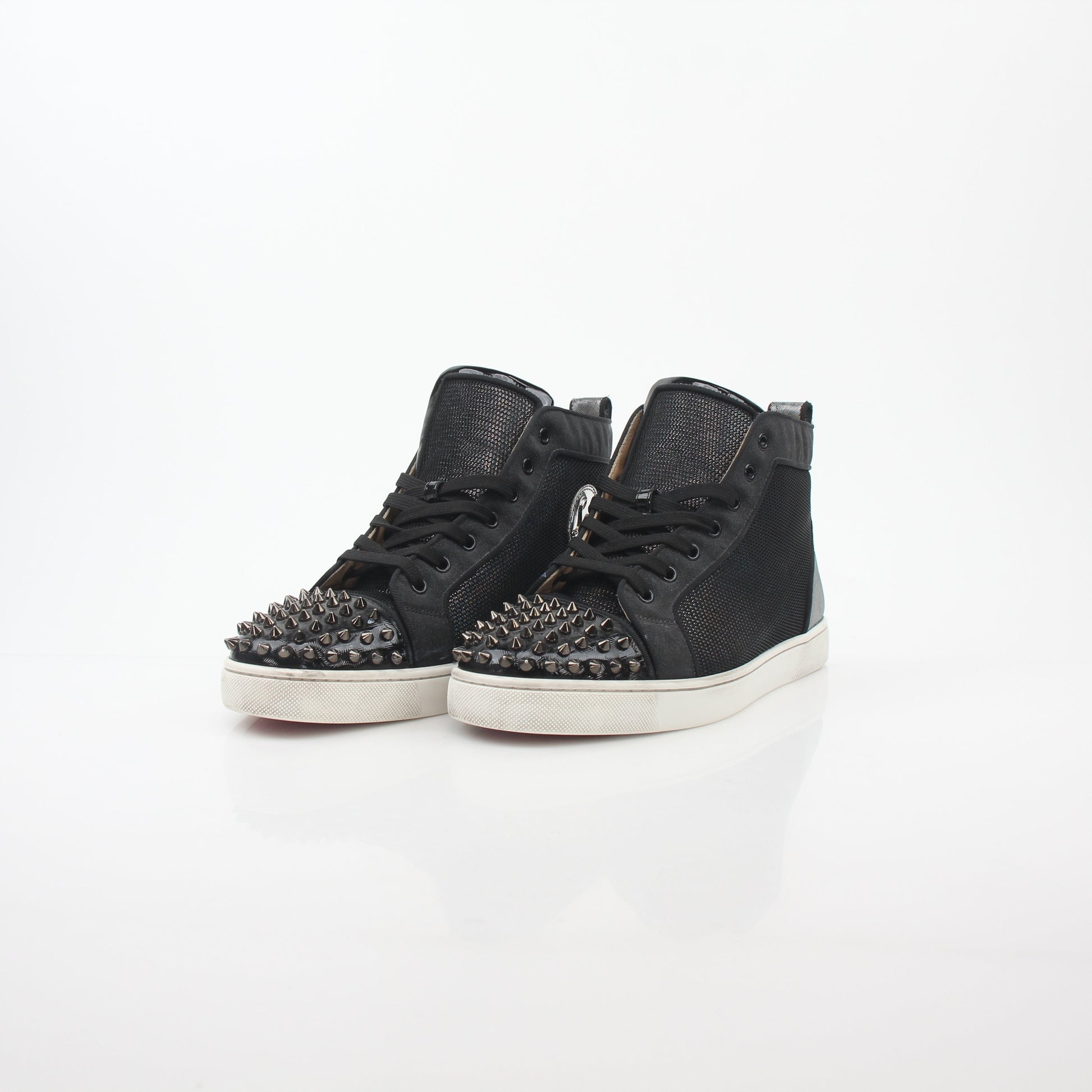 Black Christian Louboutin men's Lou Spikes Orlato high-top sneakers with spikes, stylish shoes from Gold & Beyond.