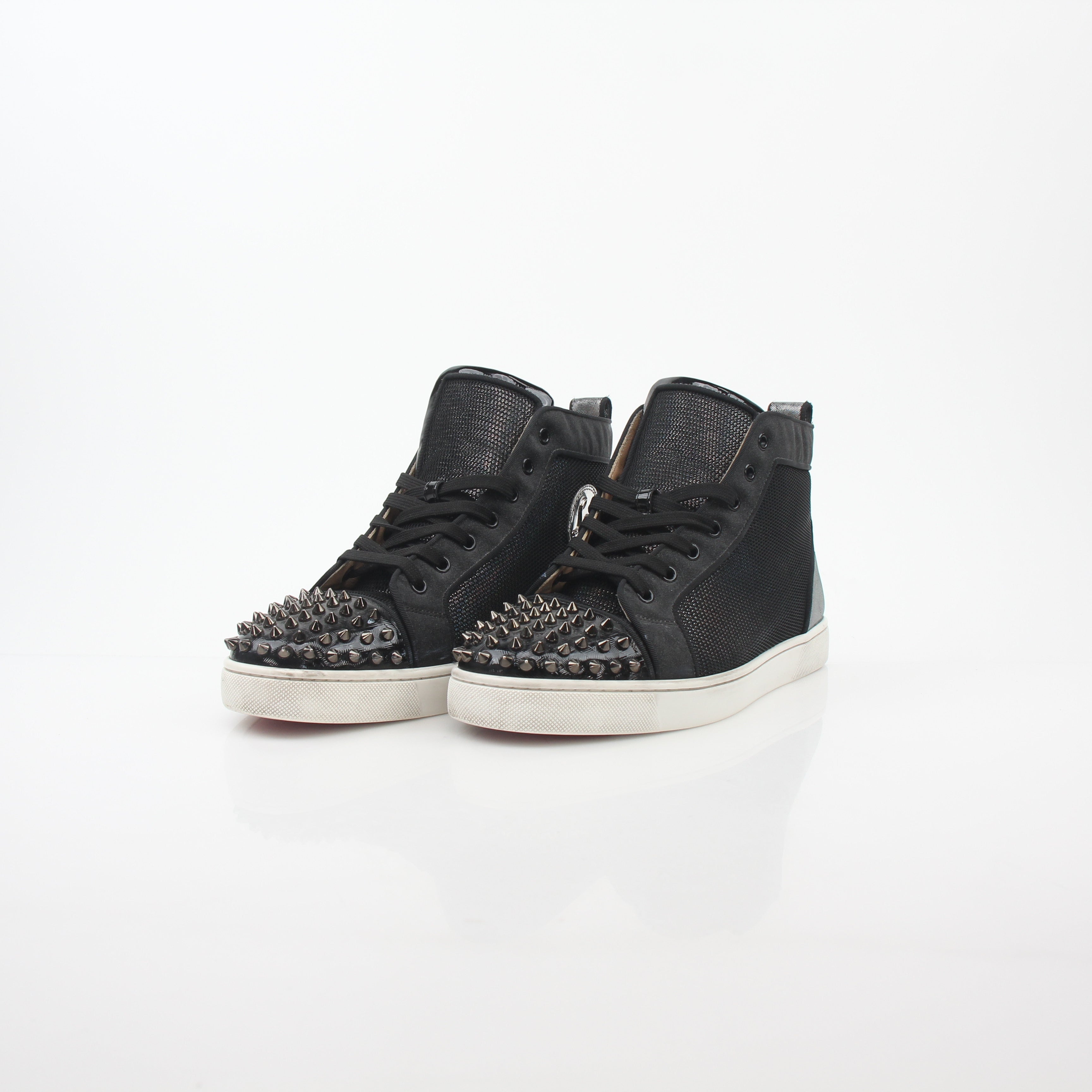 Black Christian Louboutin men's Lou Spikes Orlato high-top sneakers with spikes, stylish shoes from Gold & Beyond.