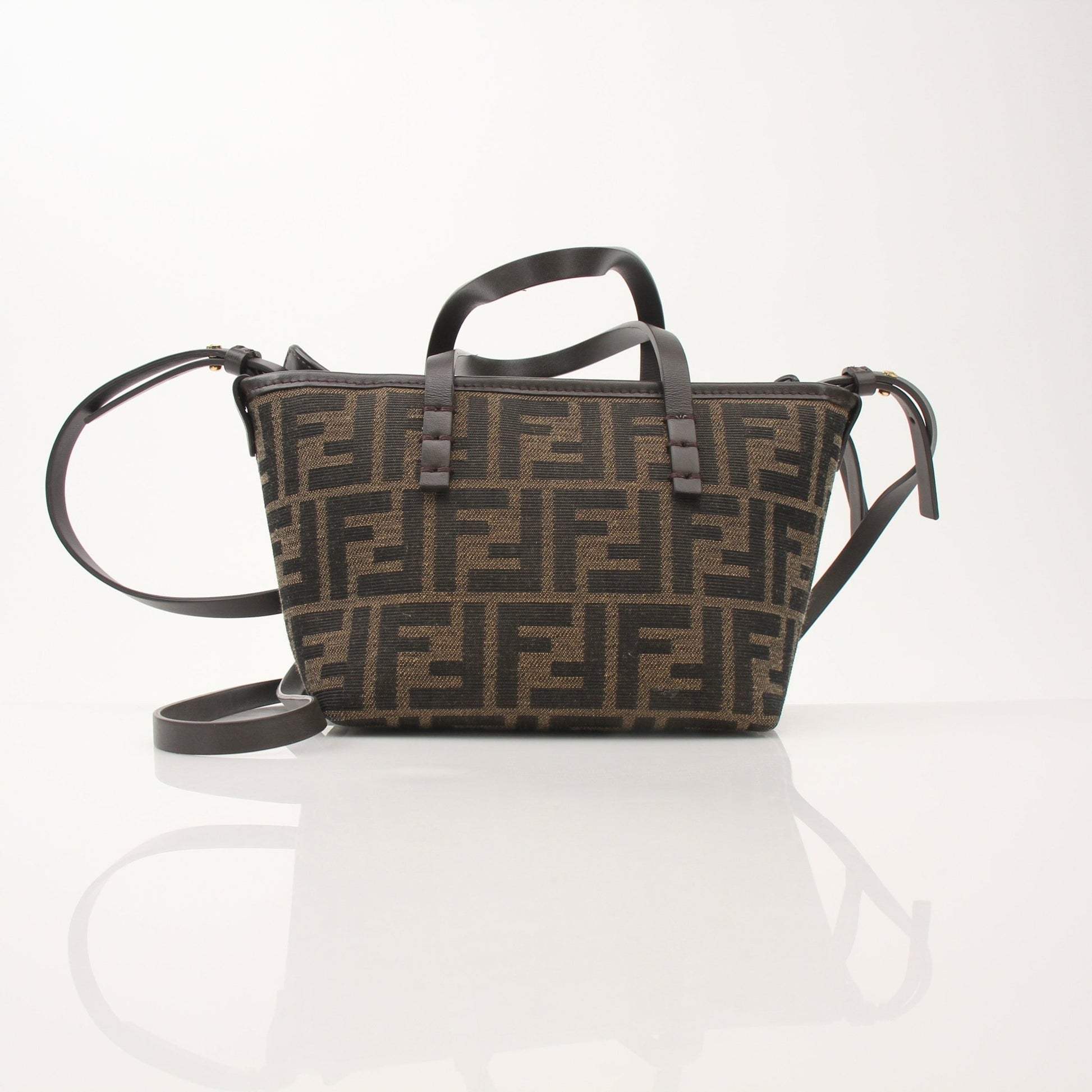 Gold & Beyond Fendi FF Jacquard Mini Roll Bag handbag with woven pattern, top handle, and compact design.