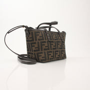 Gold & Beyond Fendi FF Jacquard Mini Roll Handbag with adjustable strap and signature logo pattern.