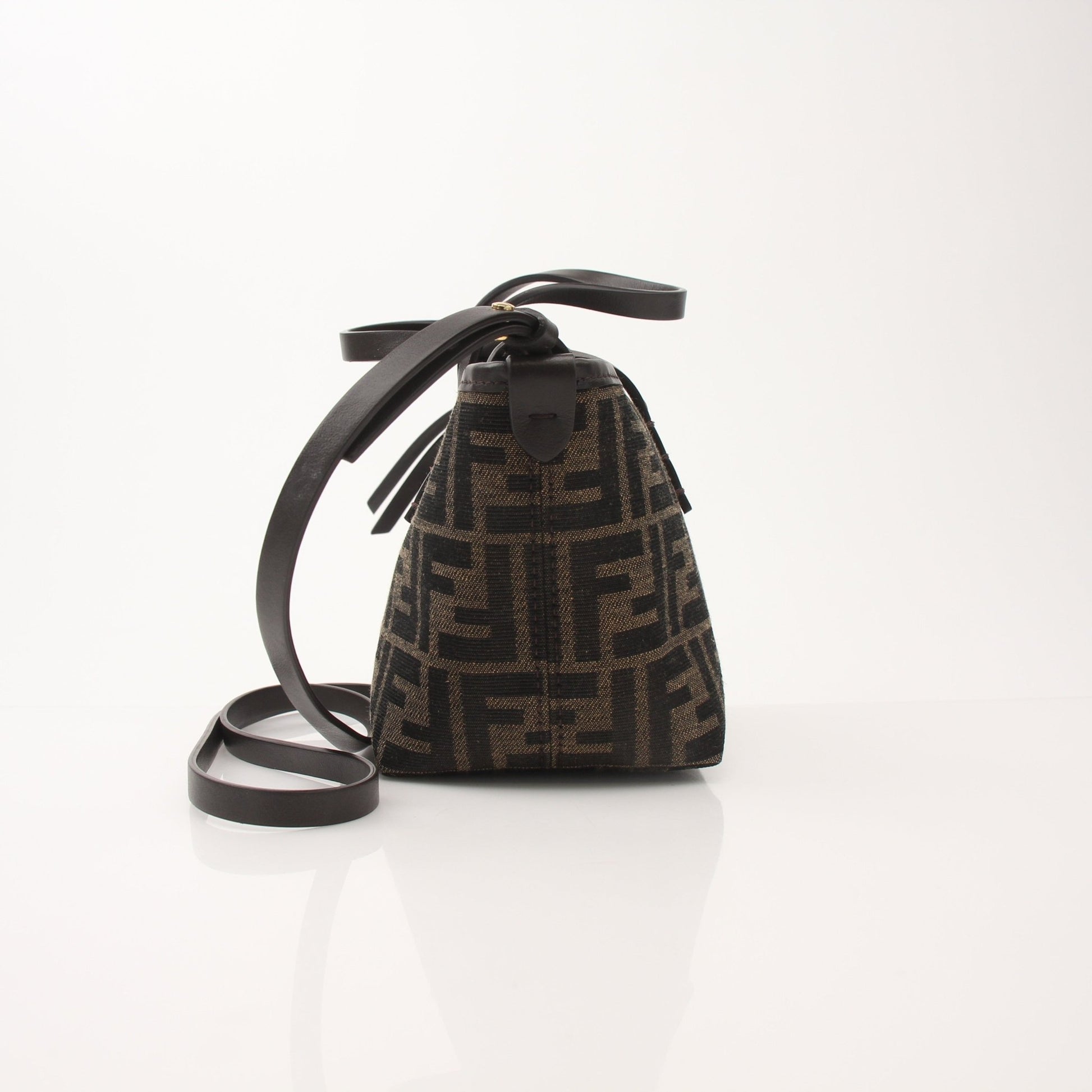 Fendi FF Jacquard Mini Roll Bag handbag with gold-tone hardware, featuring the signature monogram pattern and compact design.