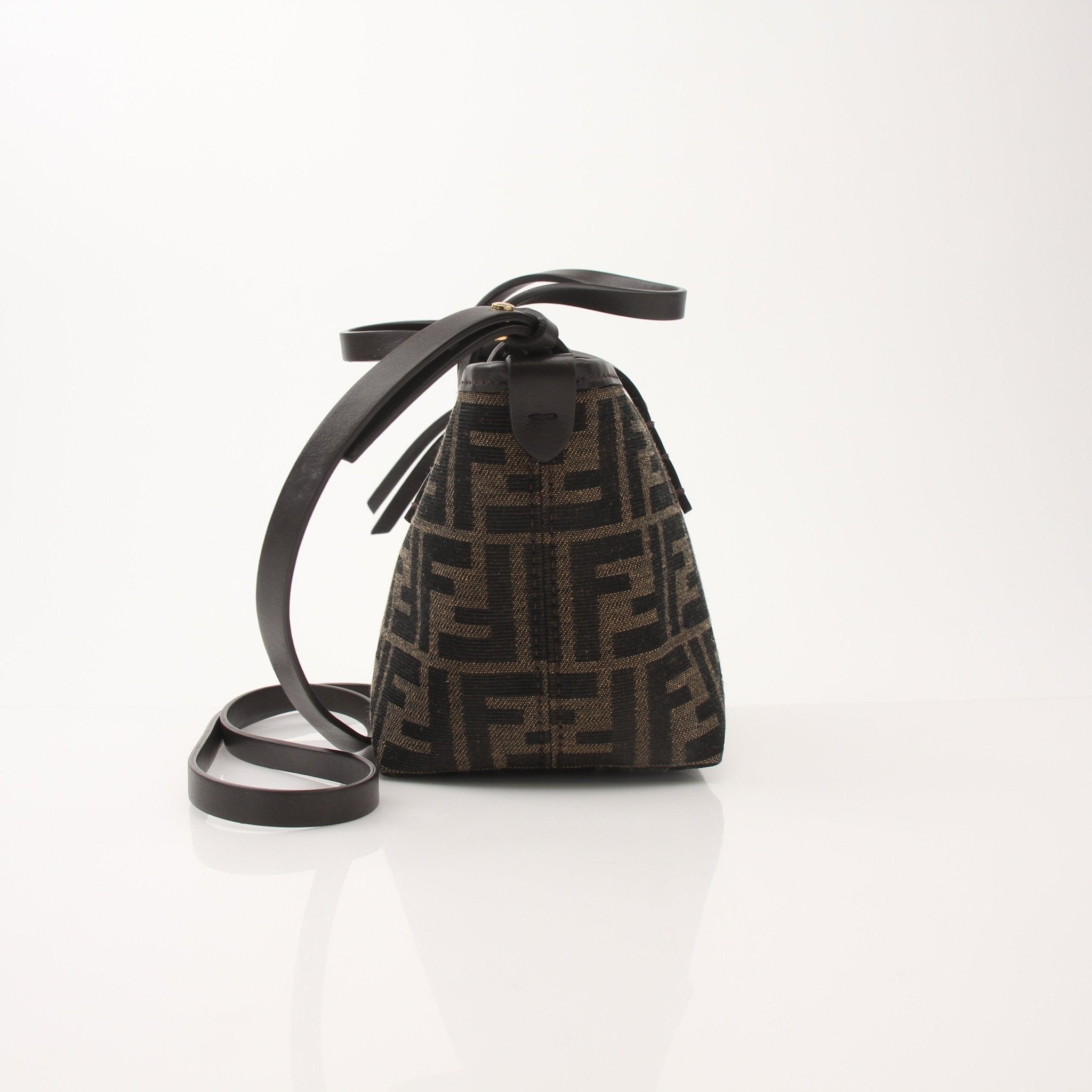 Fendi FF Jacquard Mini Roll Bag handbag with gold-tone hardware, featuring the signature monogram pattern and compact design.