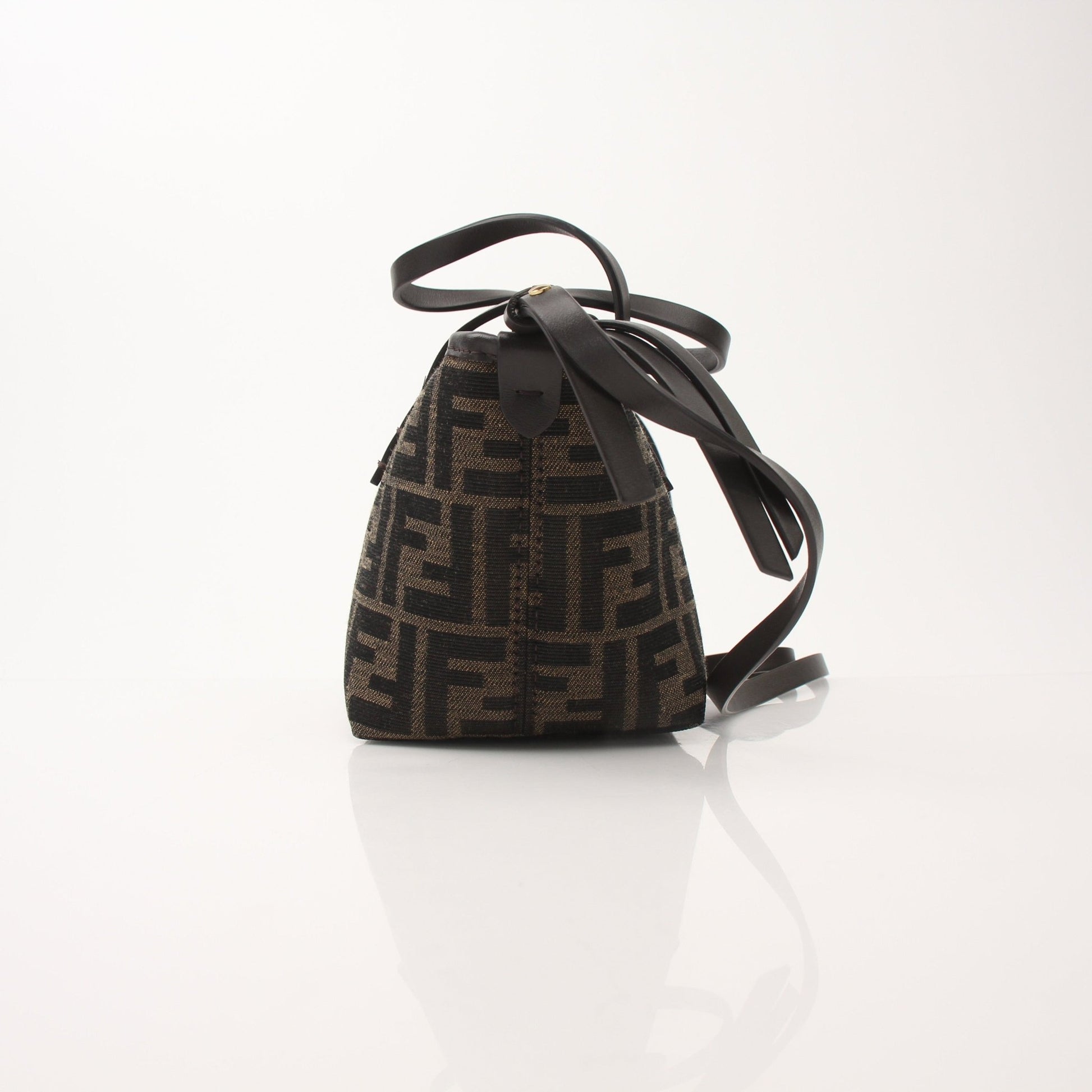 Fendi FF Jacquard Mini Roll Bag handbag with gold-tone details and compact design, displayed on a plain background