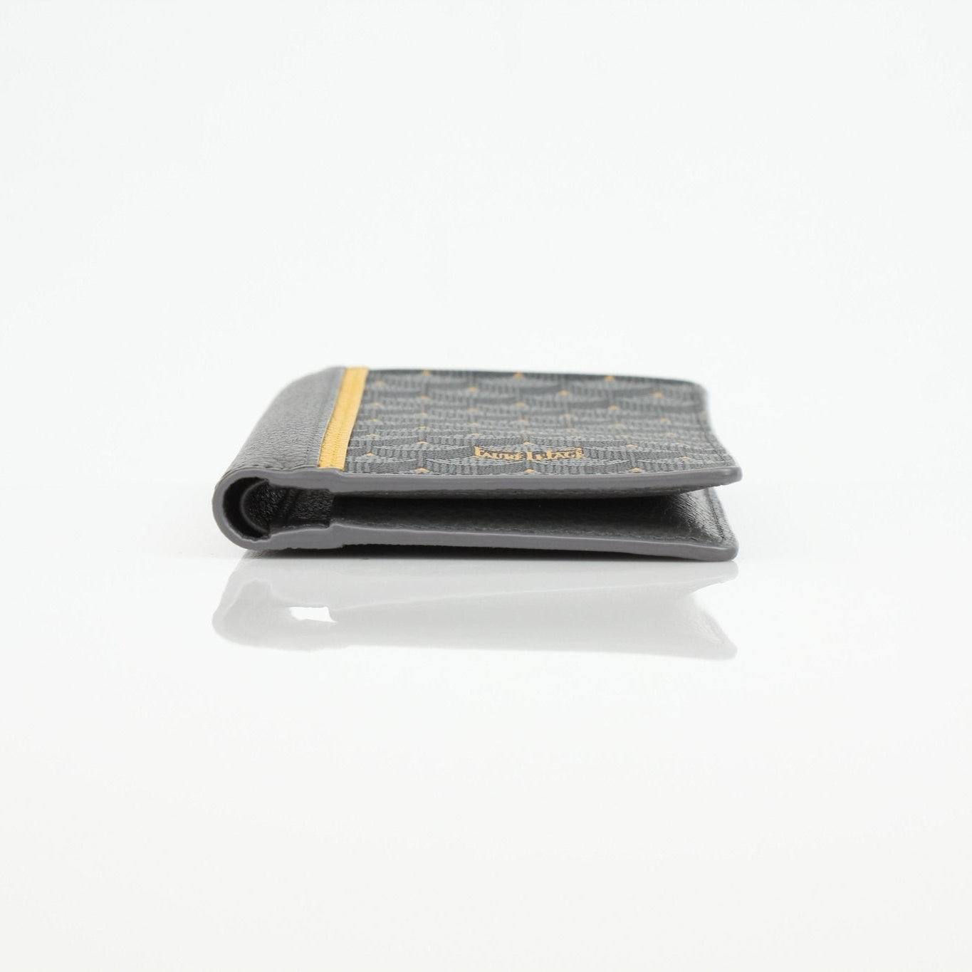 Faure Le Page Scale Canvas Wallet by Gold & Beyond showing textured canvas surface and multiple card slots.