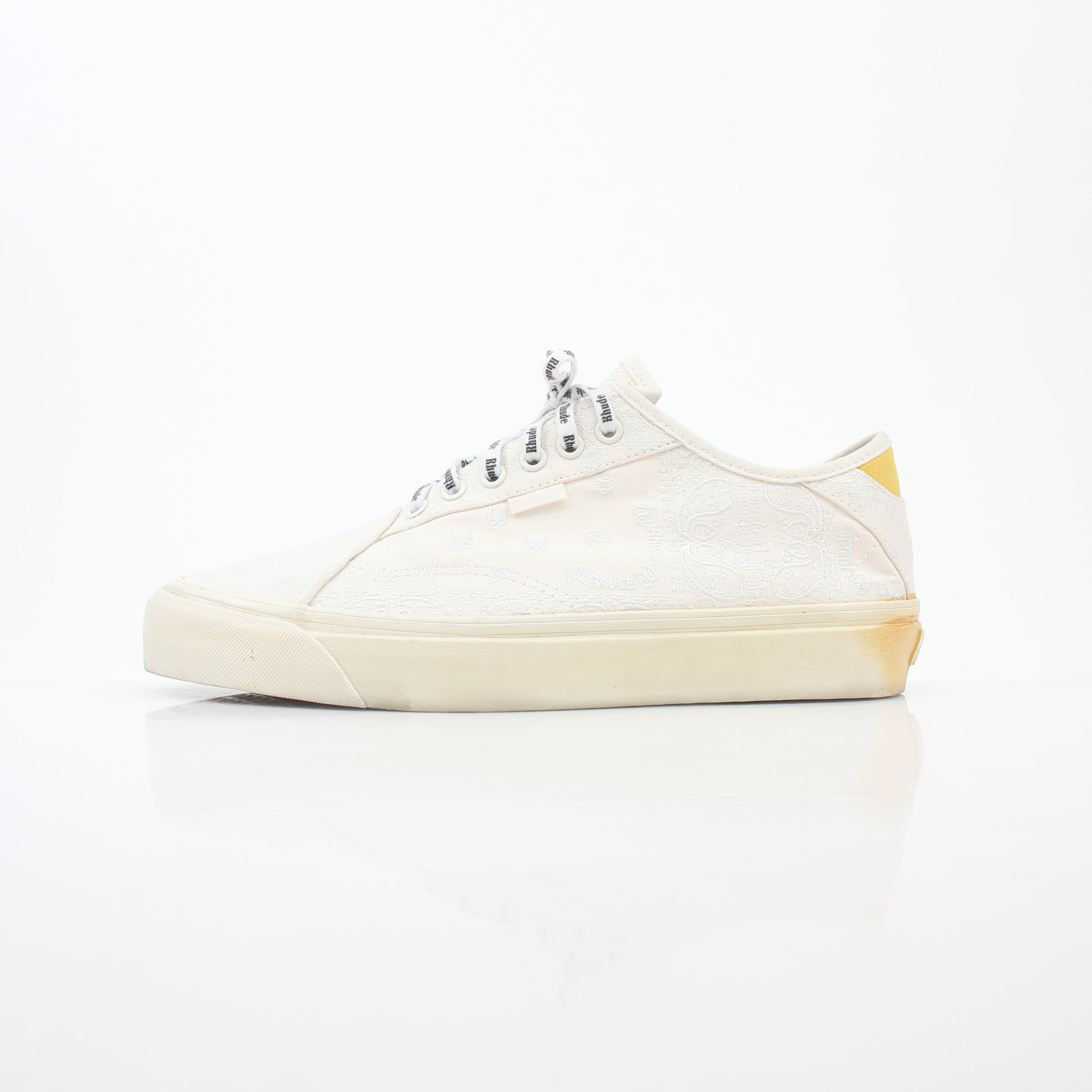 Vans x Rhude Diamo Ni Bandana White sneakers with black bandana pattern and white rubber soles, stylish casual shoes by Gold & Beyond