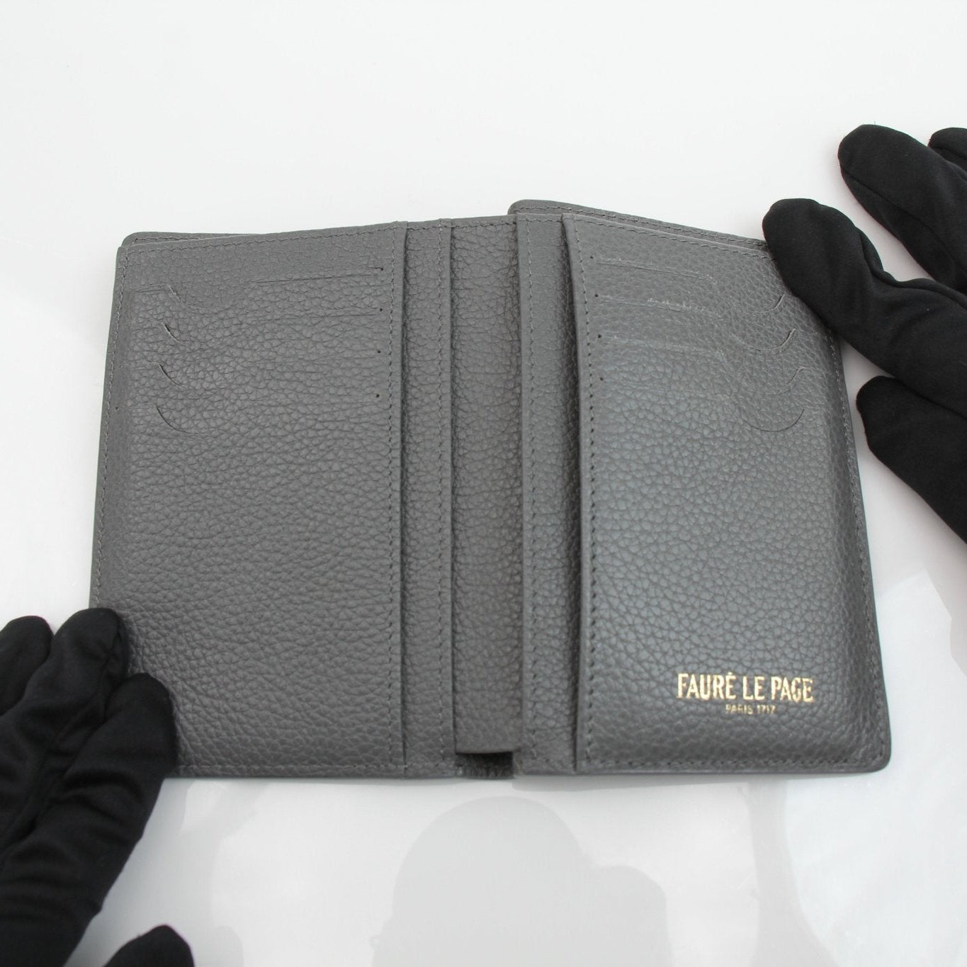 Faure Le Page Scale Canvas Wallet by Gold & Beyond showing multiple card slots and a compact design.
