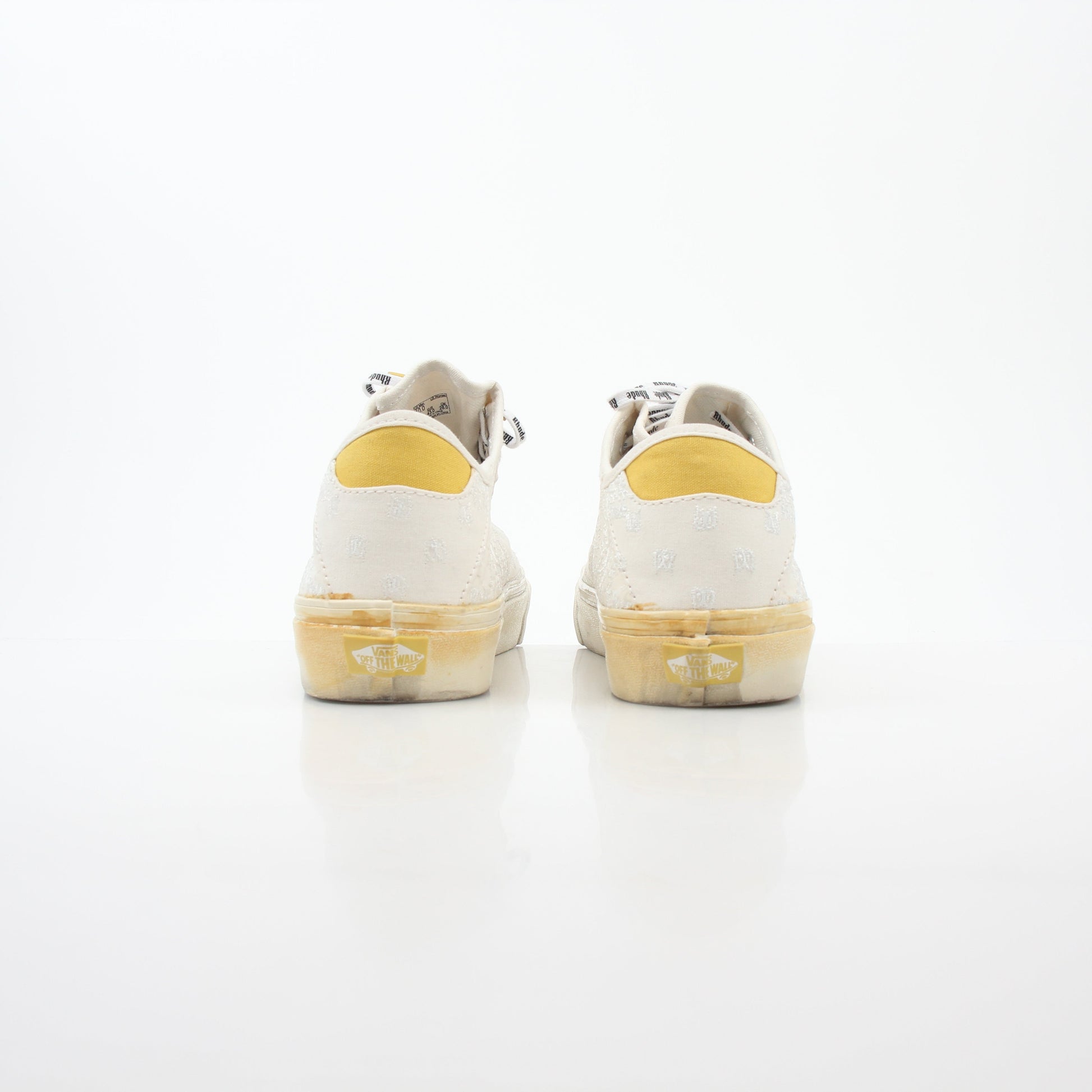 Vans x Rhude Diamo Ni Bandana white sneakers with logo details and classic low-top design, displayed on a plain background.