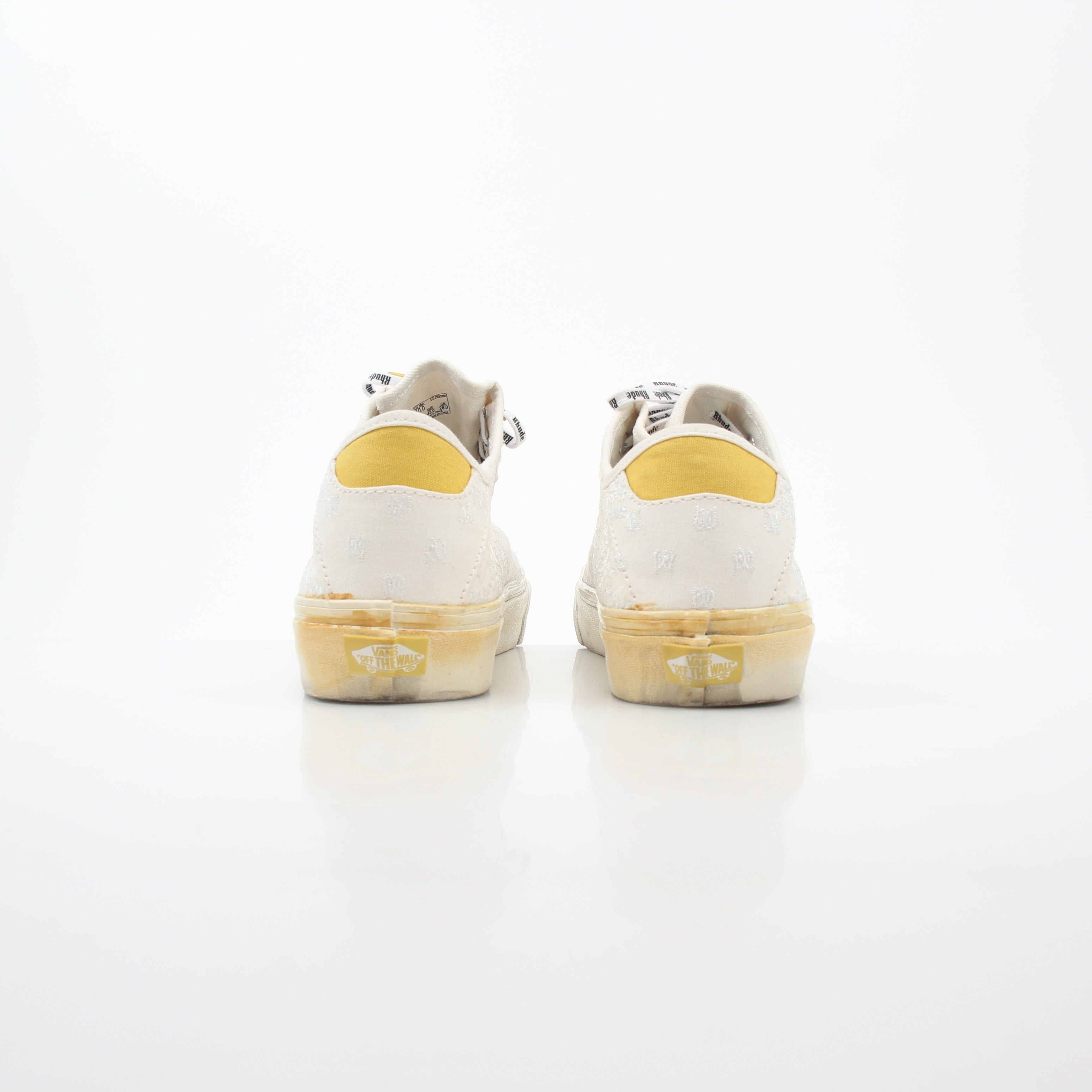 Vans x Rhude Diamo Ni Bandana white sneakers with logo details and classic low-top design, displayed on a plain background.
