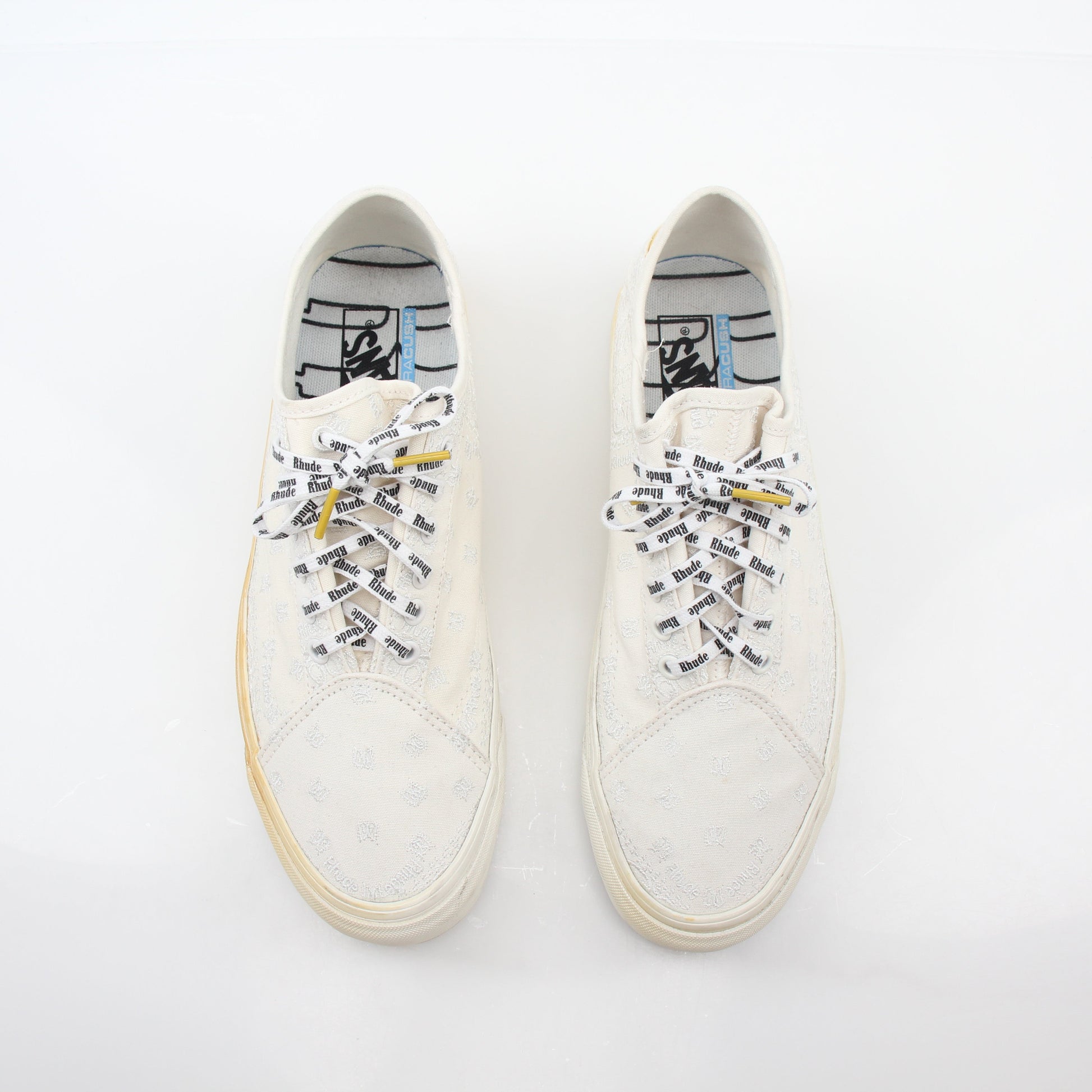 Vans x Rhude Diamo Ni Bandana White sneakers featuring bold bandana design and classic low-top skate shoe style.