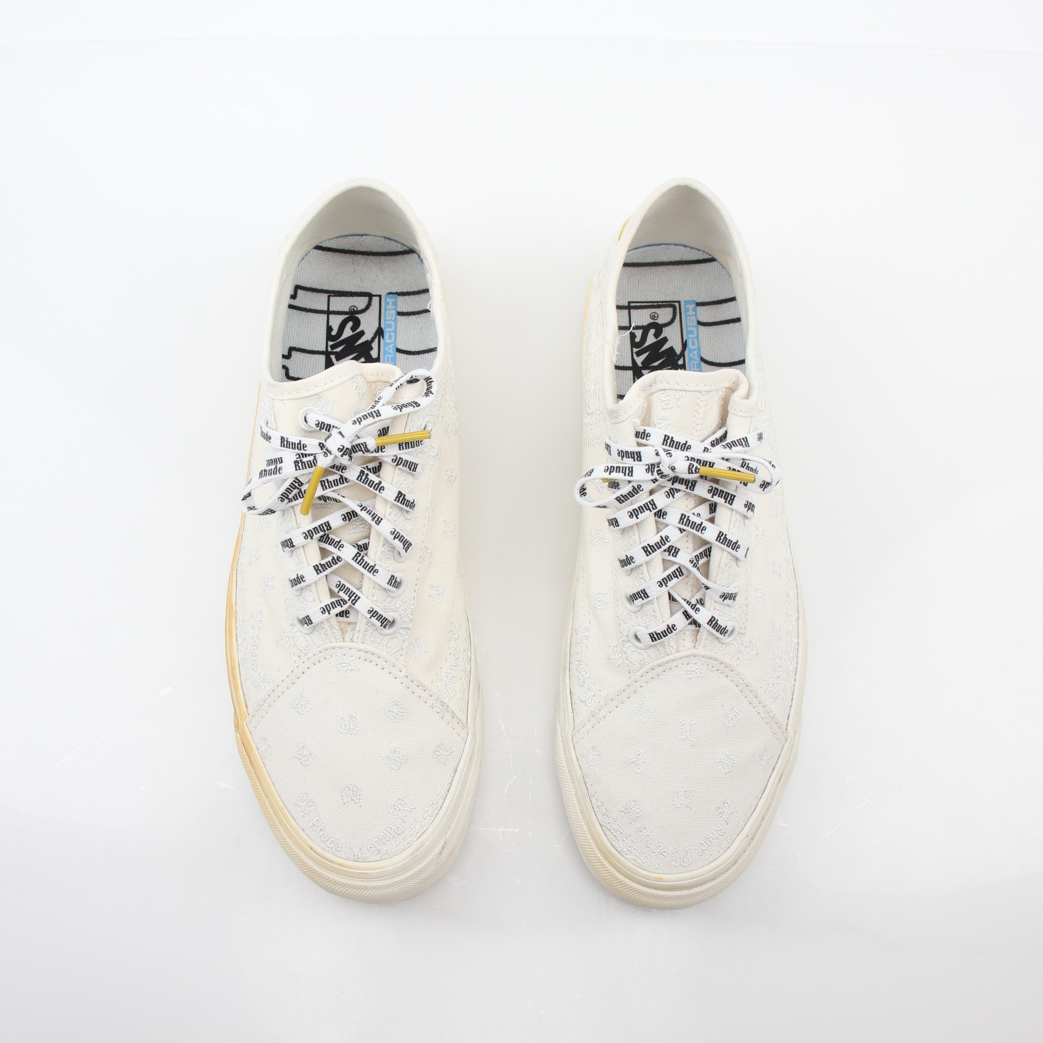 Vans x Rhude Diamo Ni Bandana White sneakers featuring bold bandana design and classic low-top skate shoe style.