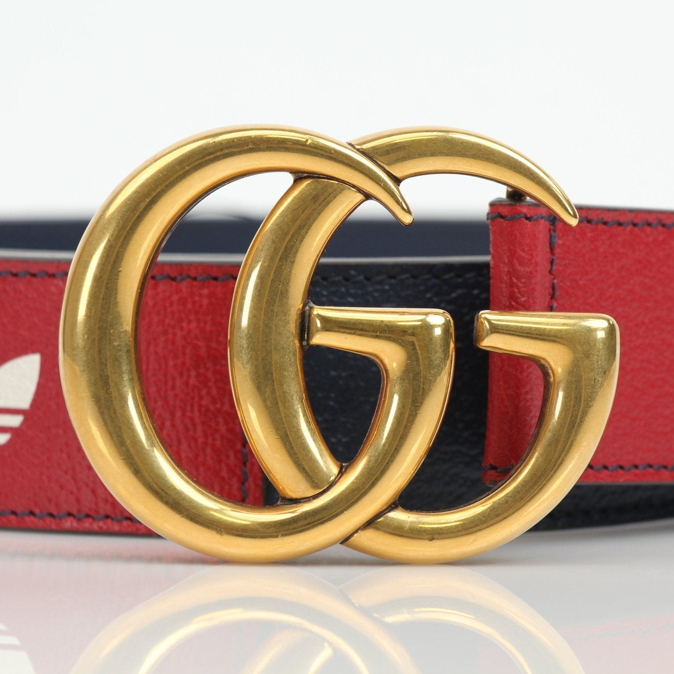 Gold & Beyond Gucci Adidas Marmont belt, stylish accessories with signature design, featuring a sleek buckle and premium leather finish.