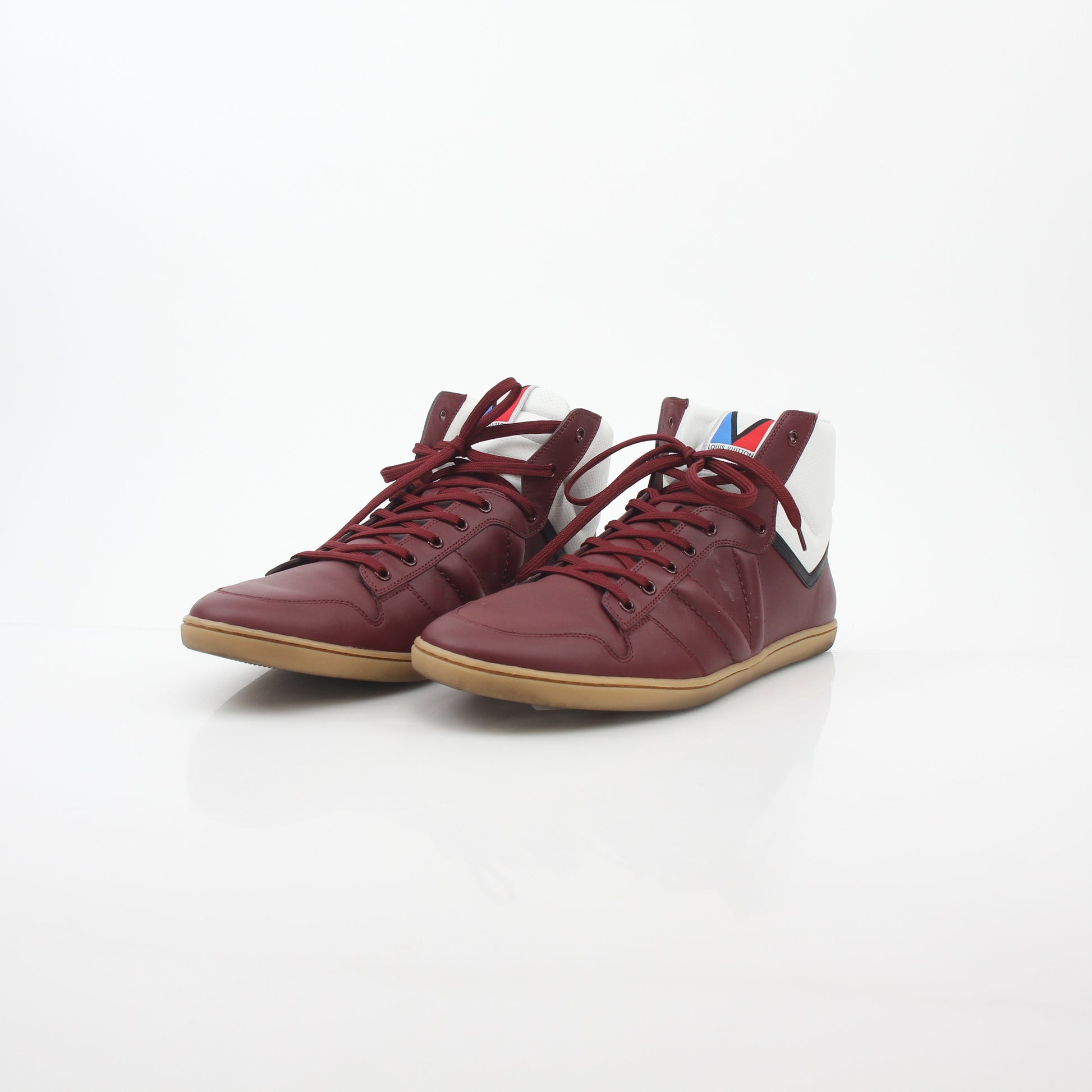 Louis Vuitton Burgundy Spitfire high-top sneakers by Gold & Beyond, featuring stylish design and premium leather construction.