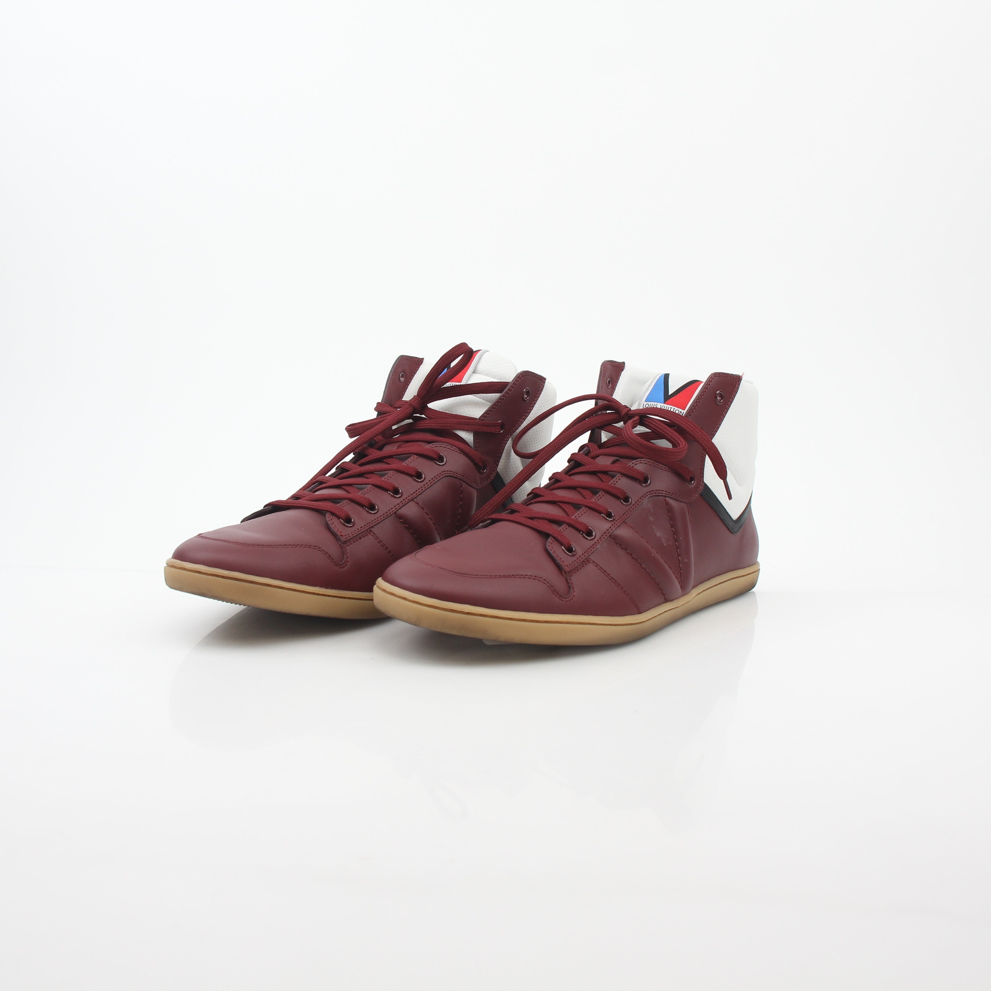 Louis Vuitton Burgundy Spitfire high-top sneakers by Gold & Beyond, featuring stylish design and premium leather construction.