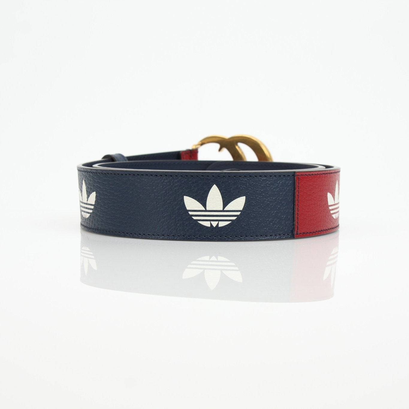 Gold & Beyond Gucci Adidas Marmont belt, stylish accessories with a designer logo buckle on a leather strap.