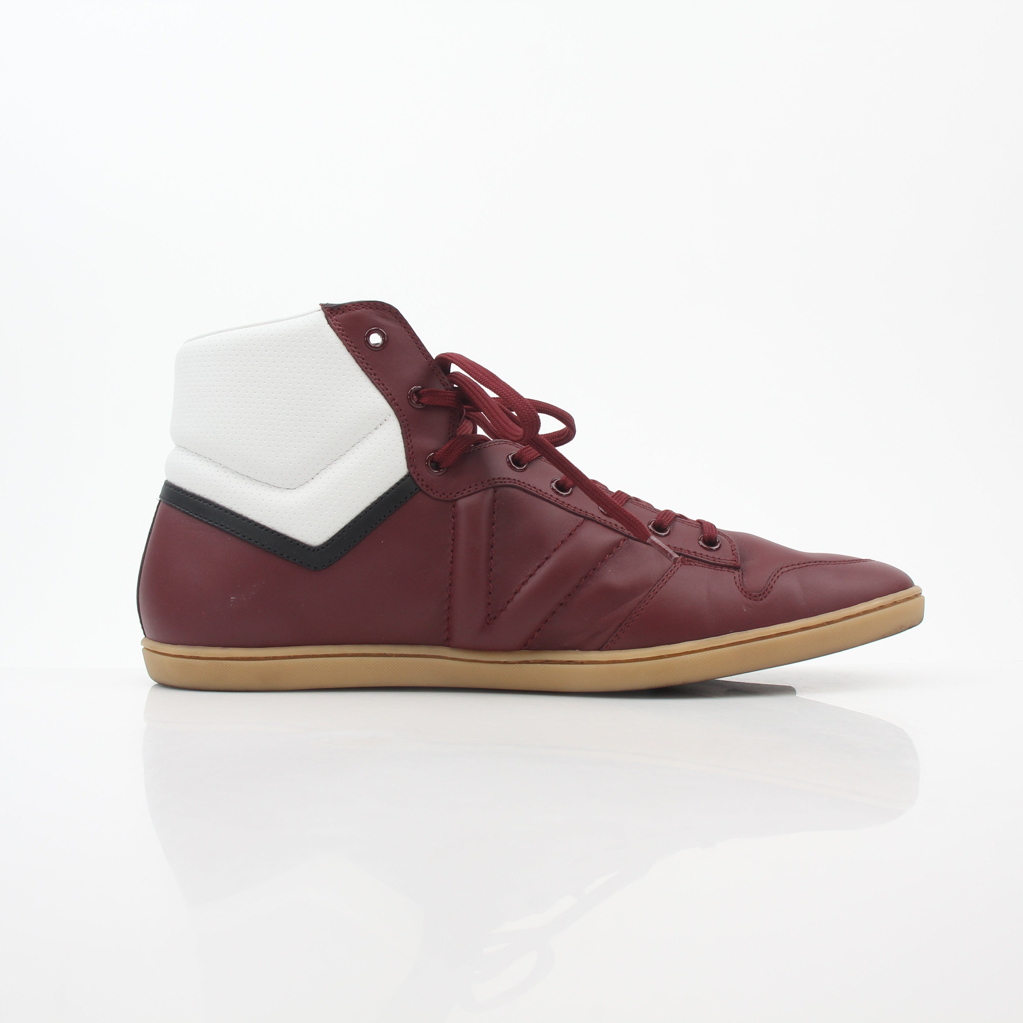 Louis Vuitton Burgundy Spitfire high-top sneakers by Gold & Beyond showing the stylish burgundy leather shoes with white soles and laces.