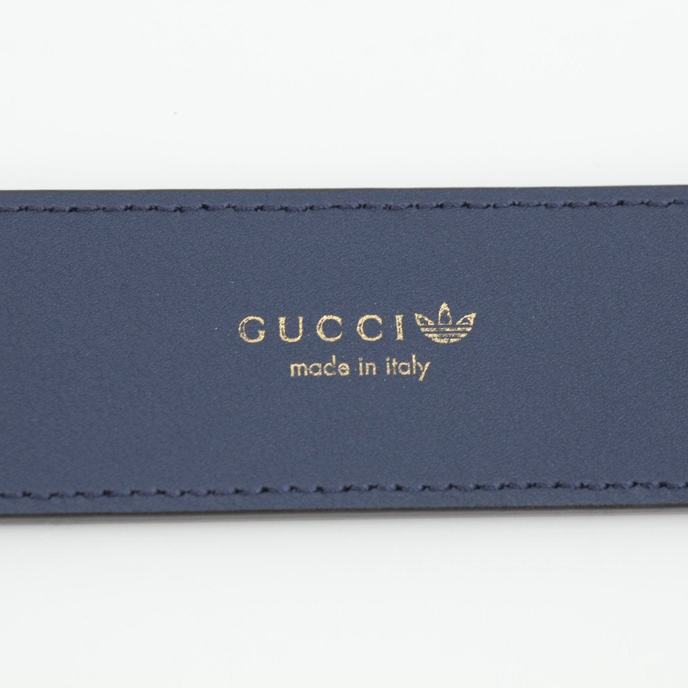 Gold & Beyond Gucci Adidas Marmont belt, stylish accessories with the signature logo and sleek design, shown in the image.
