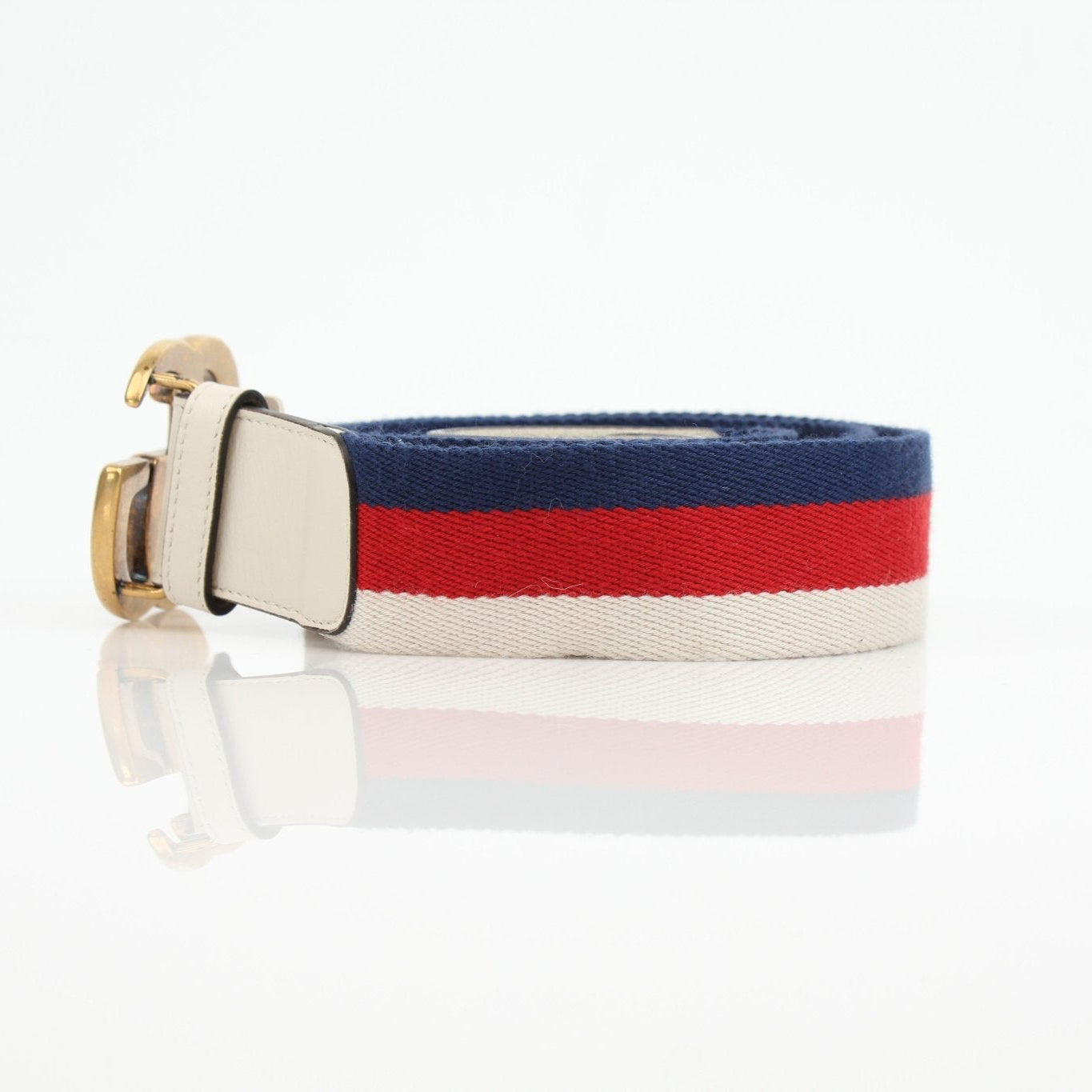 Gucci Marmont Web Canvas Belt with gold hardware, stylish accessories featuring the iconic design and brand logo.