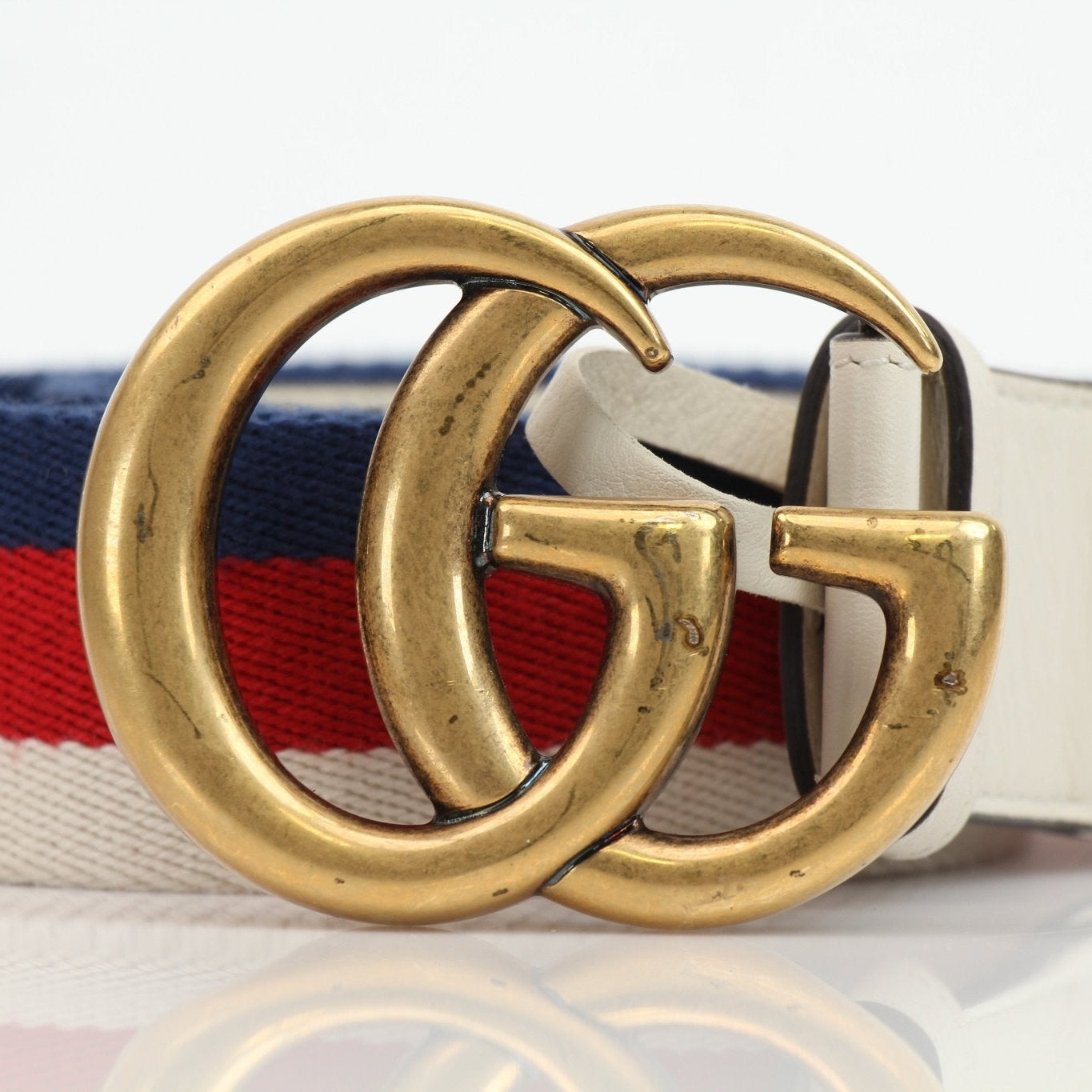 Gucci Marmont Web Canvas Belt with gold hardware, stylish accessory featuring signature design and adjustable strap.