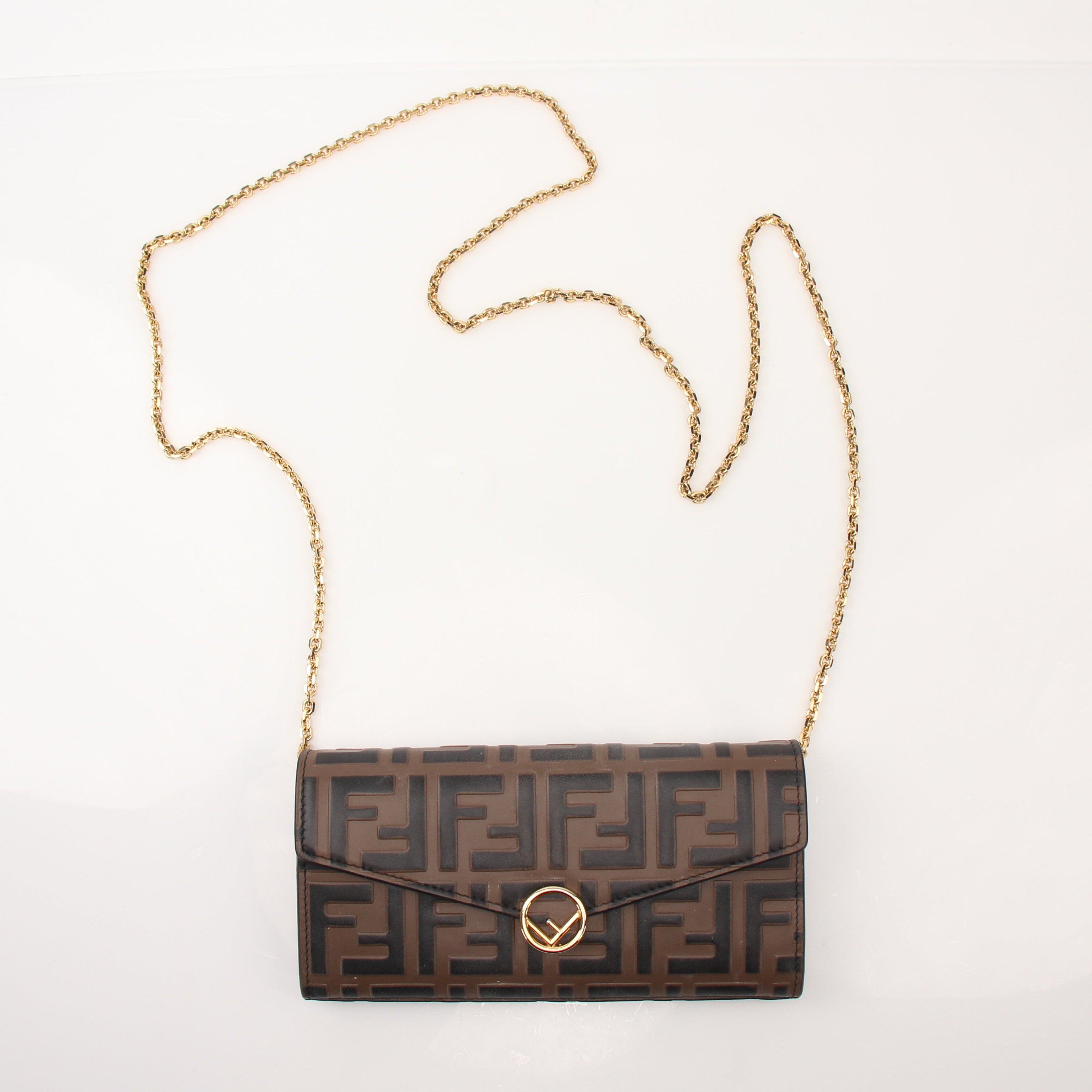 Fendi F Is Fendi Continental Envelope Wallet on Chain with gold hardware and signature logo pattern on black leather.
