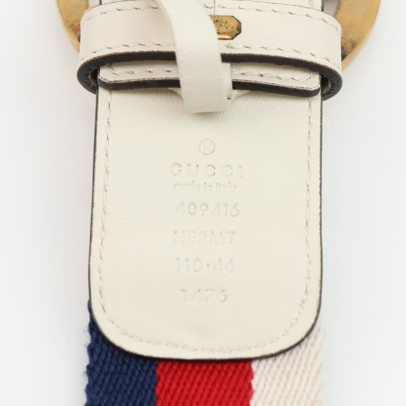 Gucci Marmont Web Canvas Belt with gold buckle, stylish accessories featuring signature Gucci design and branding.