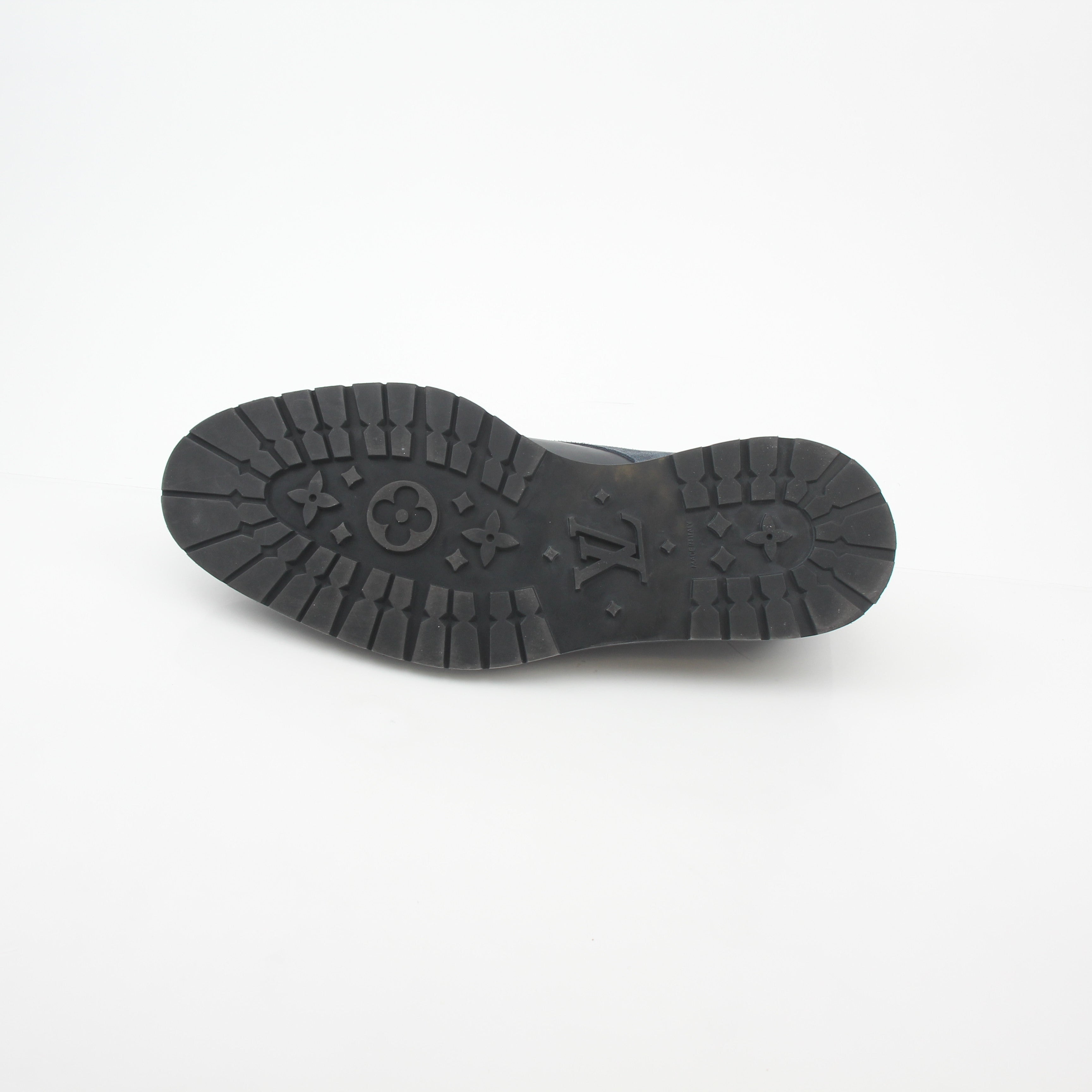 Louis Vuitton black and charcoal Damier suede derby shoes with sleek design and stylish laces, displayed on a white background.