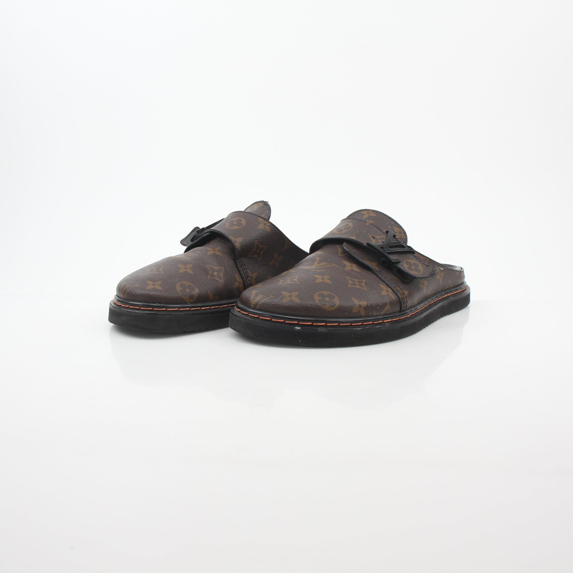 Louis Vuitton Monogram LV Line Mule Shoes by Gold & Beyond, featuring classic monogram design and stylish slip-on footwear.