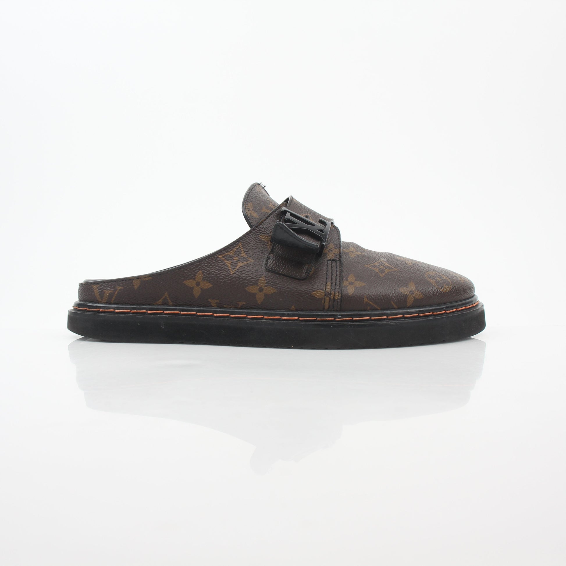 Louis Vuitton Monogram LV Line mule shoes by Gold & Beyond, featuring a stylish slip-on design with the iconic monogram pattern.