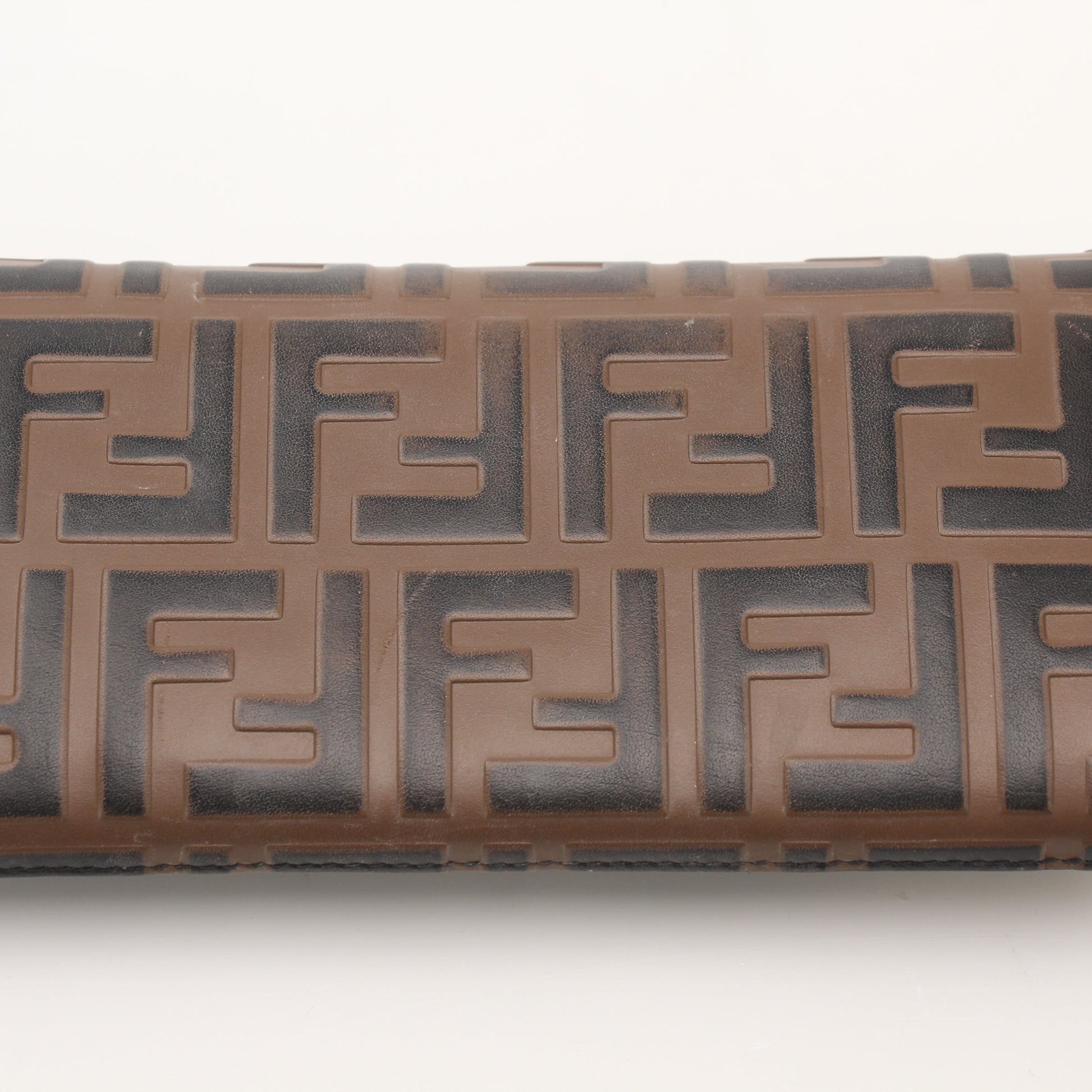 Fendi F Is Fendi continental envelope wallet on chain in gold with signature logo and sleek design, displayed on a neutral background.