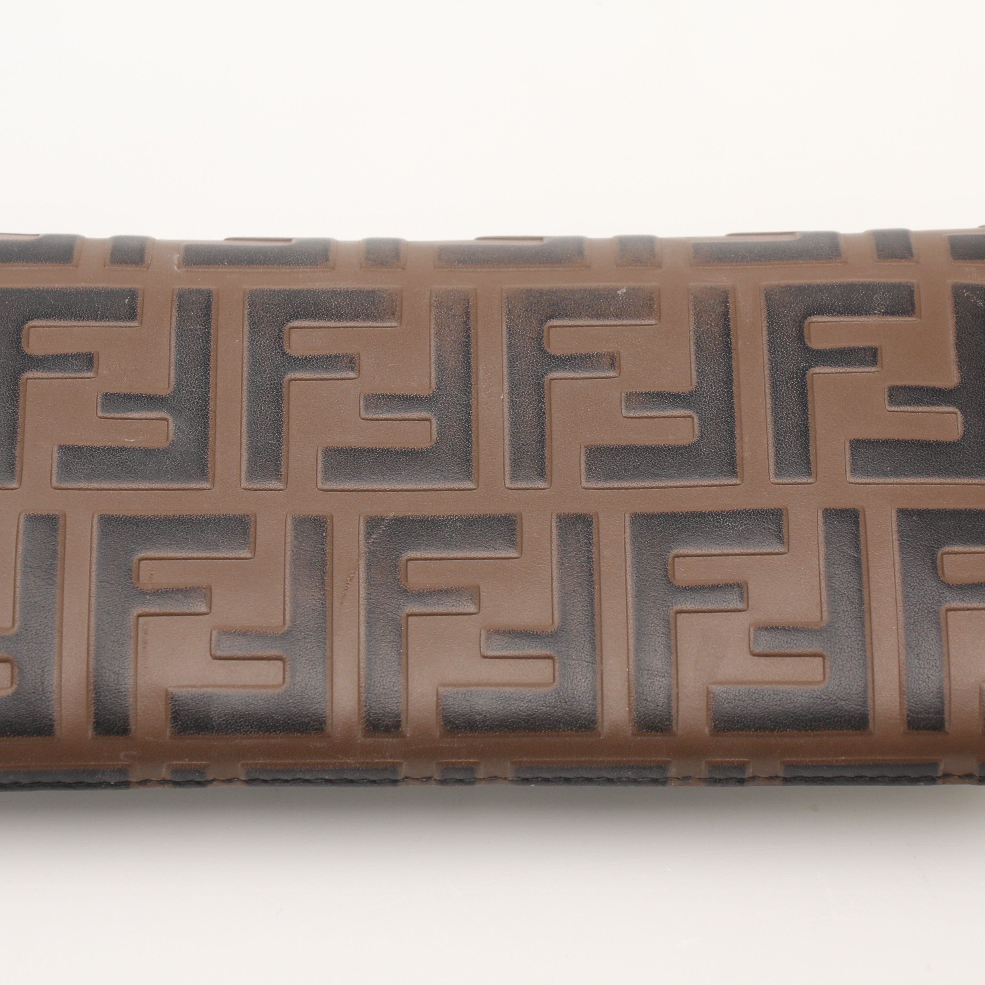 Fendi F Is Fendi continental envelope wallet on chain in gold with signature logo and sleek design, displayed on a neutral background.