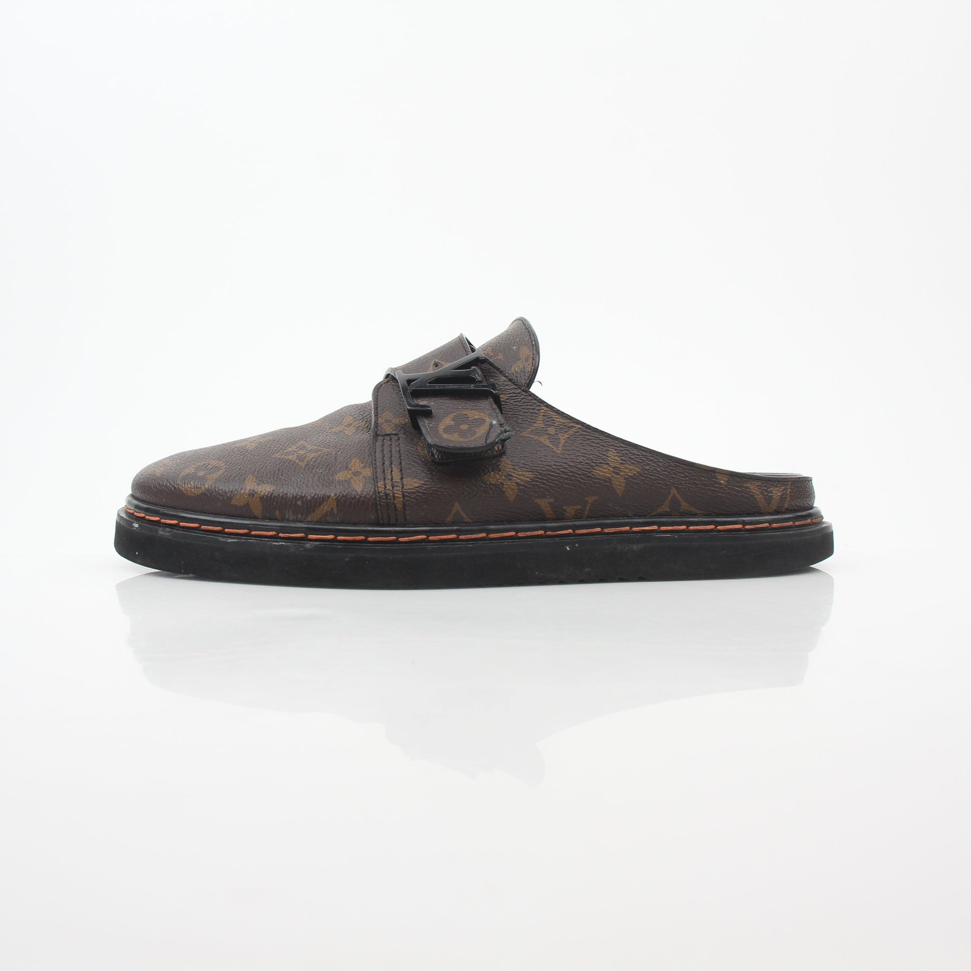 Louis Vuitton Monogram LV Line Mule Shoes by Gold & Beyond, featuring the iconic monogram pattern and stylish slip-on design.