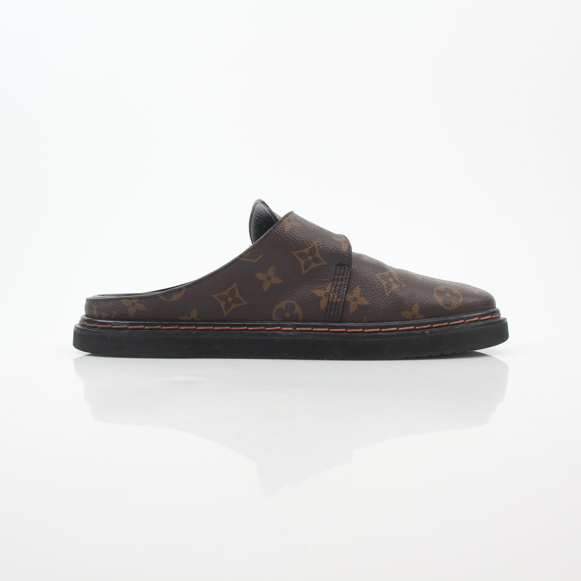 Louis Vuitton Monogram LV Line Mule Shoes by Gold & Beyond, featuring classic monogram pattern and sleek slip-on design.