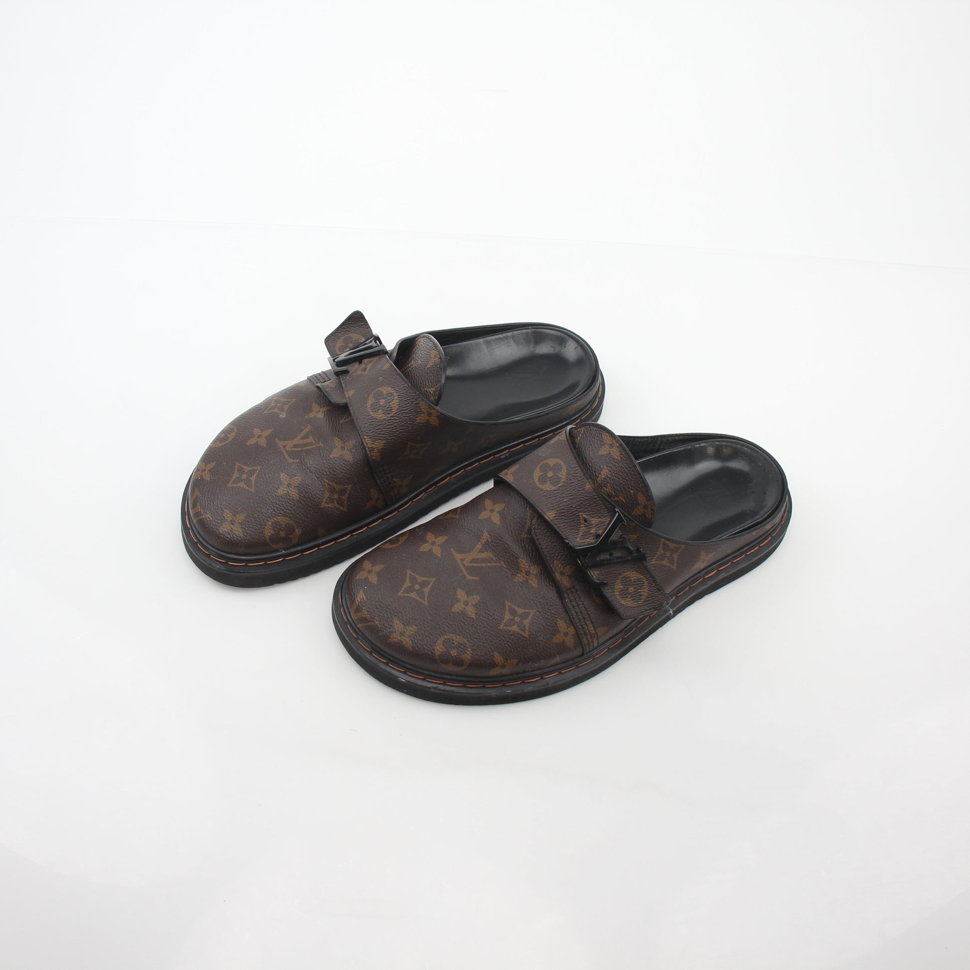 Louis Vuitton Monogram LV Line Mule Shoes by Gold & Beyond, stylish slip-on shoes with monogram pattern and cushioned soles.