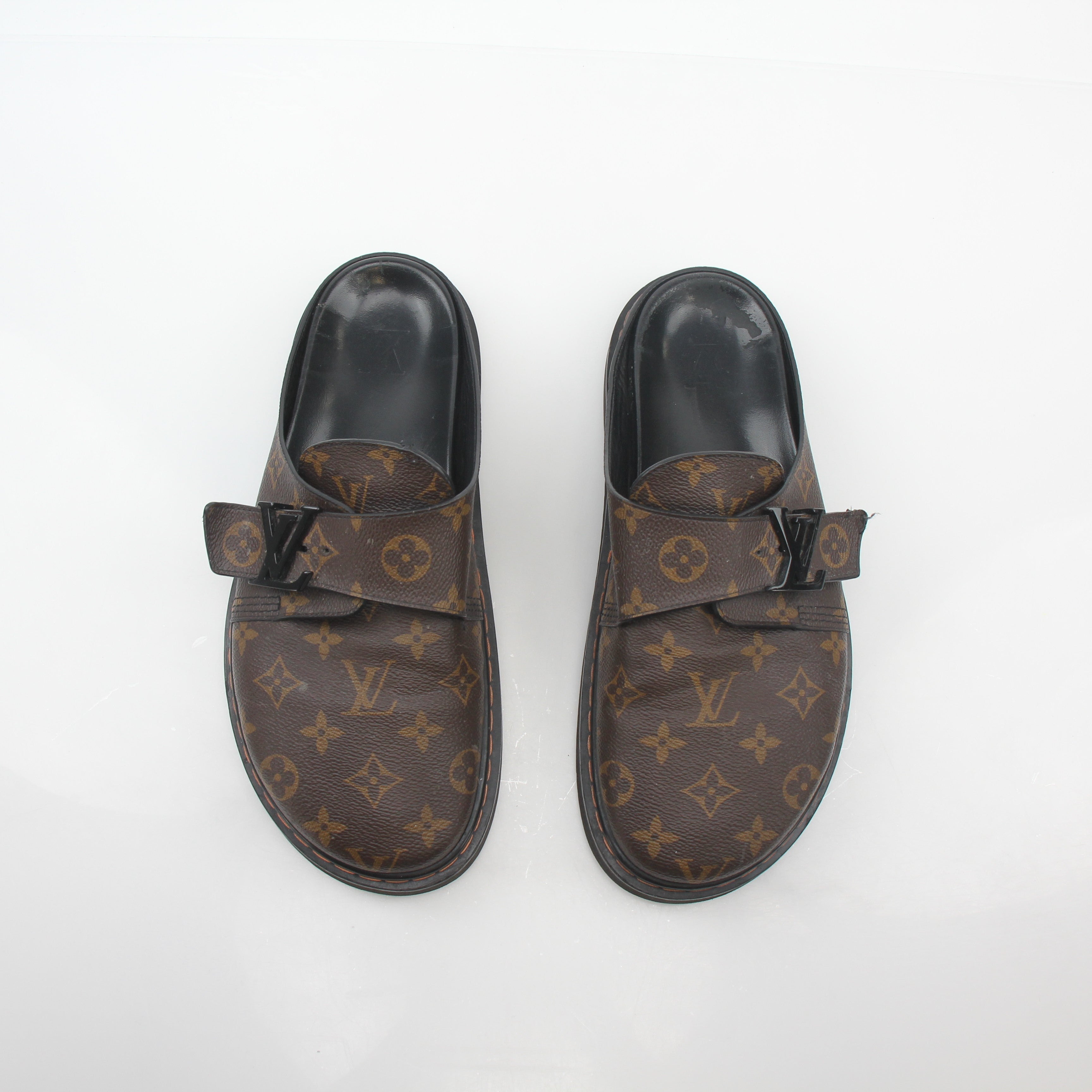 Louis Vuitton Monogram LV Line mule shoes by Gold & Beyond, featuring classic monogram pattern and stylish slip-on design.