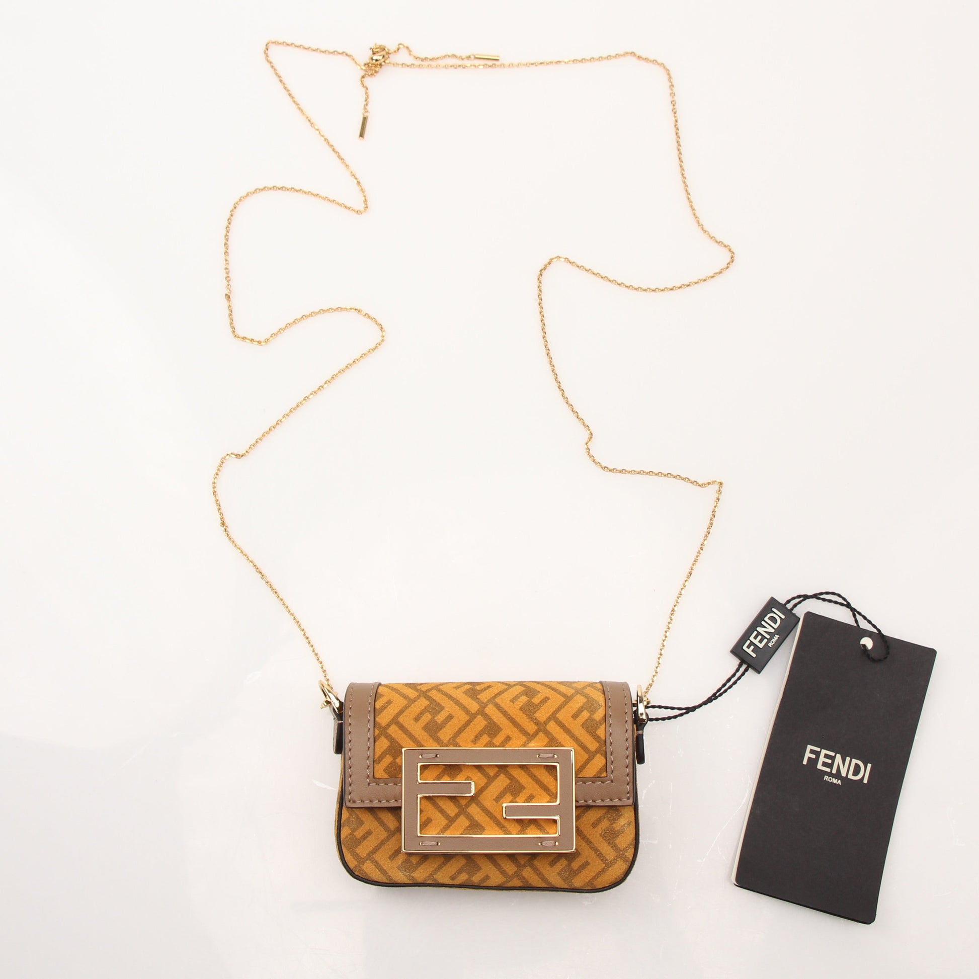 Fendi Chain Baguette Charm Bag in Zucca suede with gold-tone chain and signature design, small handbag with stylish details.