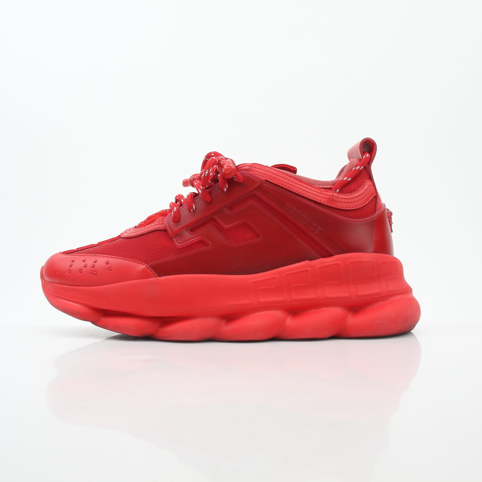 Gold & Beyond Versace Red Chain Reaction 2 Chainz sneakers, stylish shoes with bold red and chain design, displayed on a plain background.